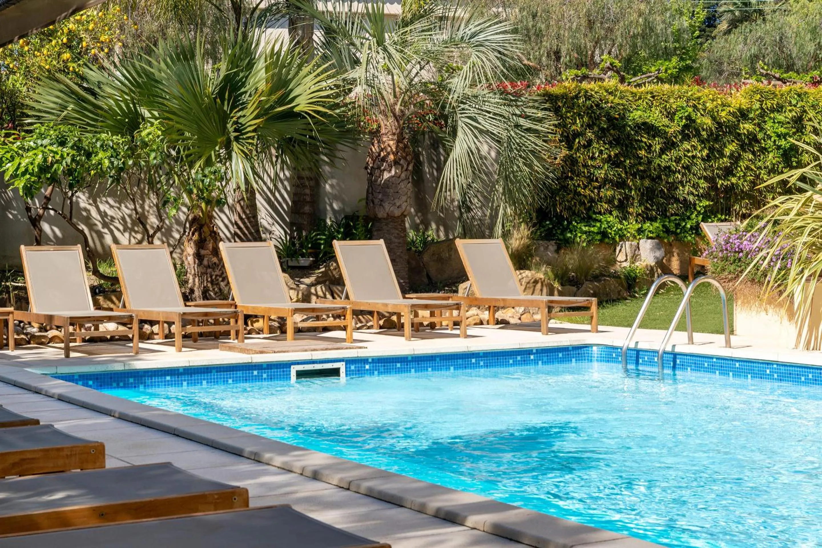 Swimming pool in Best Western Premier Montfleuri