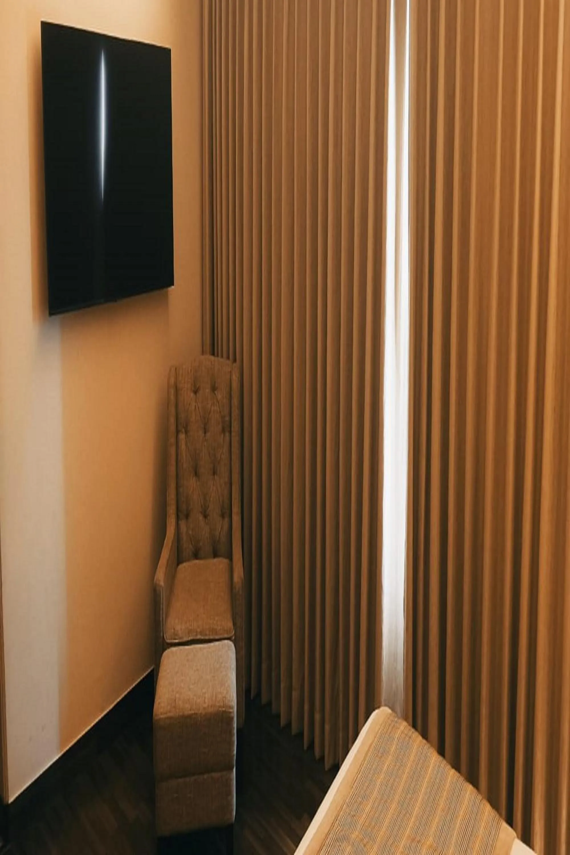 Living room in Hotel Home In By Amrik Sukhdev