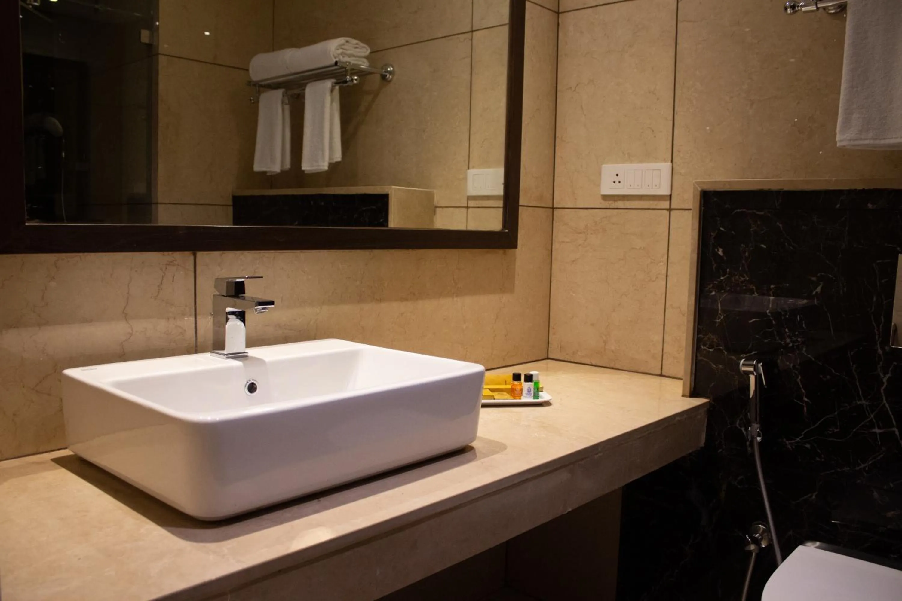 Bathroom in Shivas Galaxy Hotel