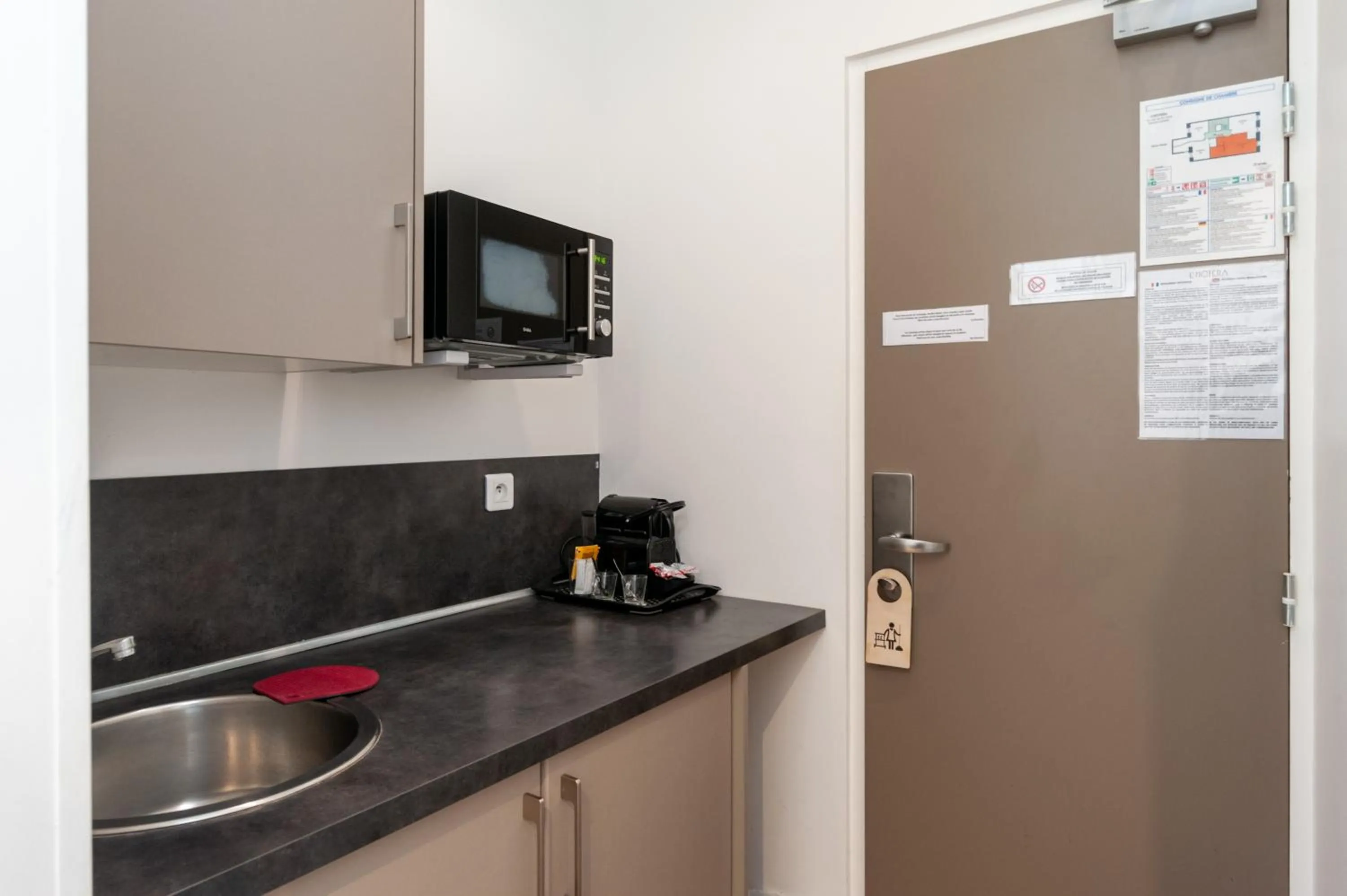 Kitchen or kitchenette in Hotel l'Hotera