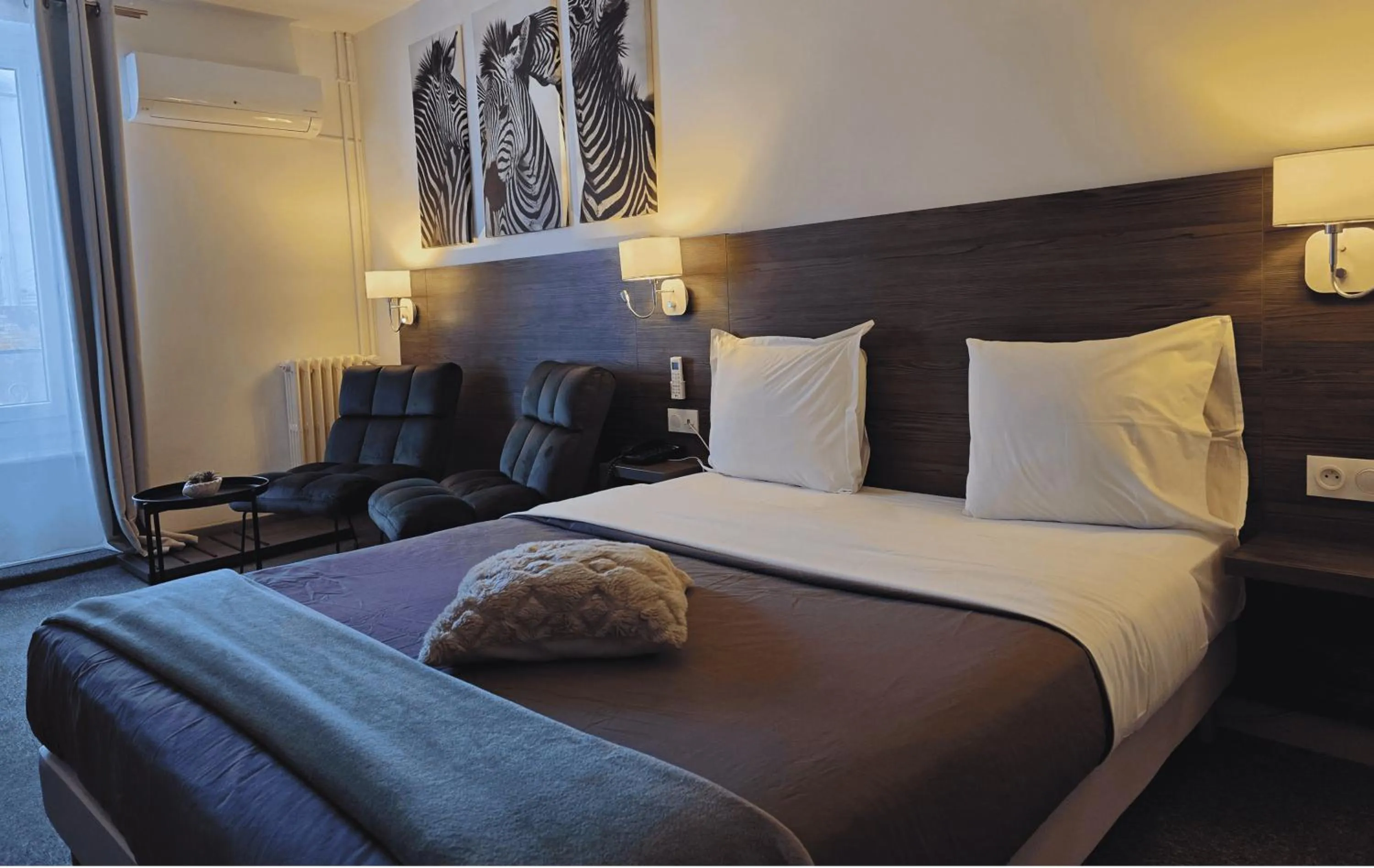 Bed in Hôtel L'Alsace