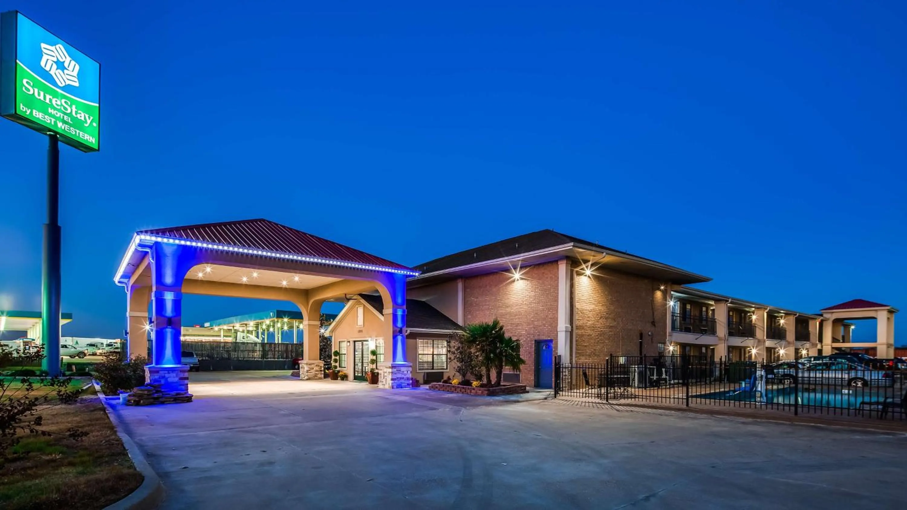 Property building in SureStay Hotel by Best Western Terrell