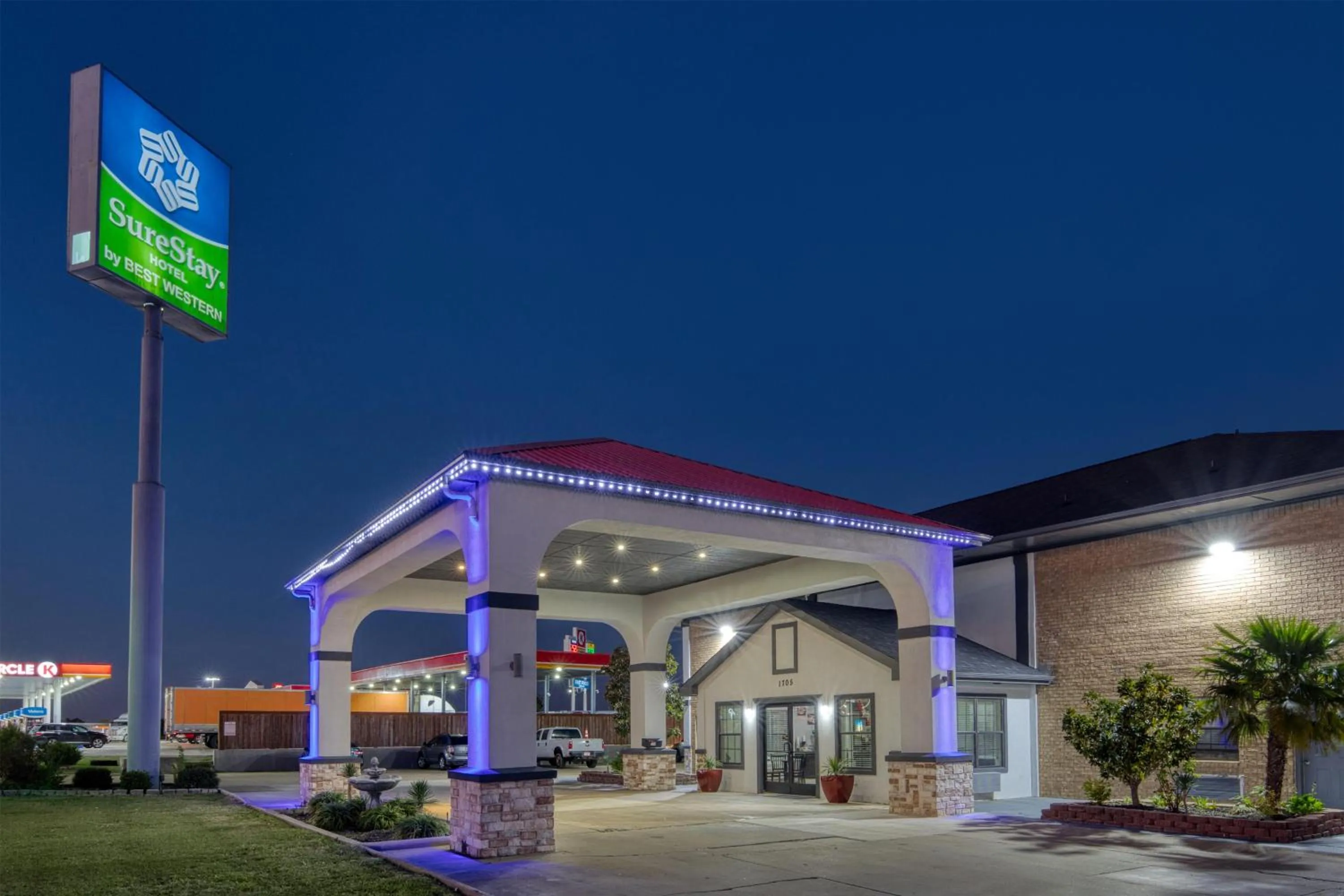 Property building in SureStay Hotel by Best Western Terrell