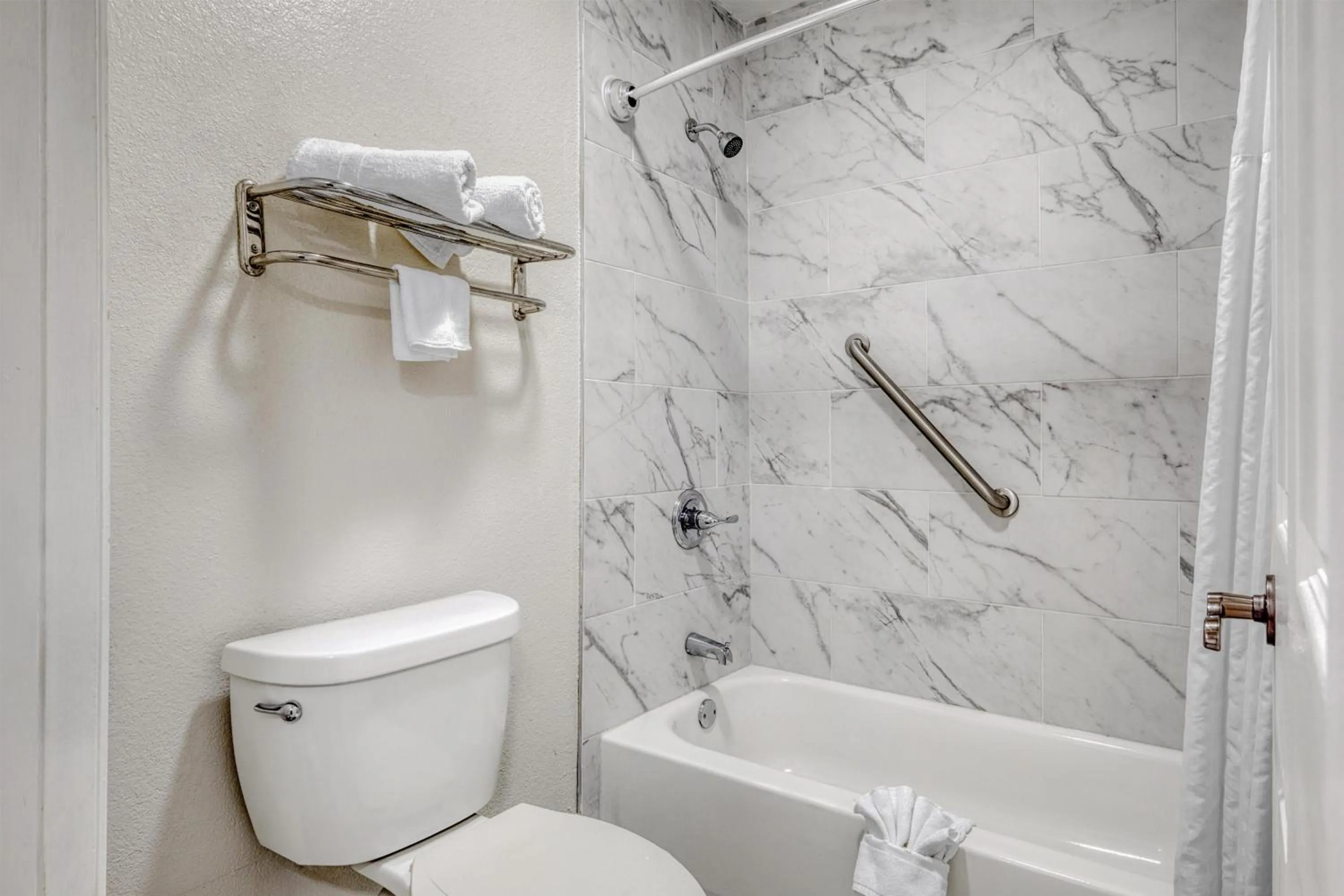 Bathroom in SureStay Hotel by Best Western Terrell