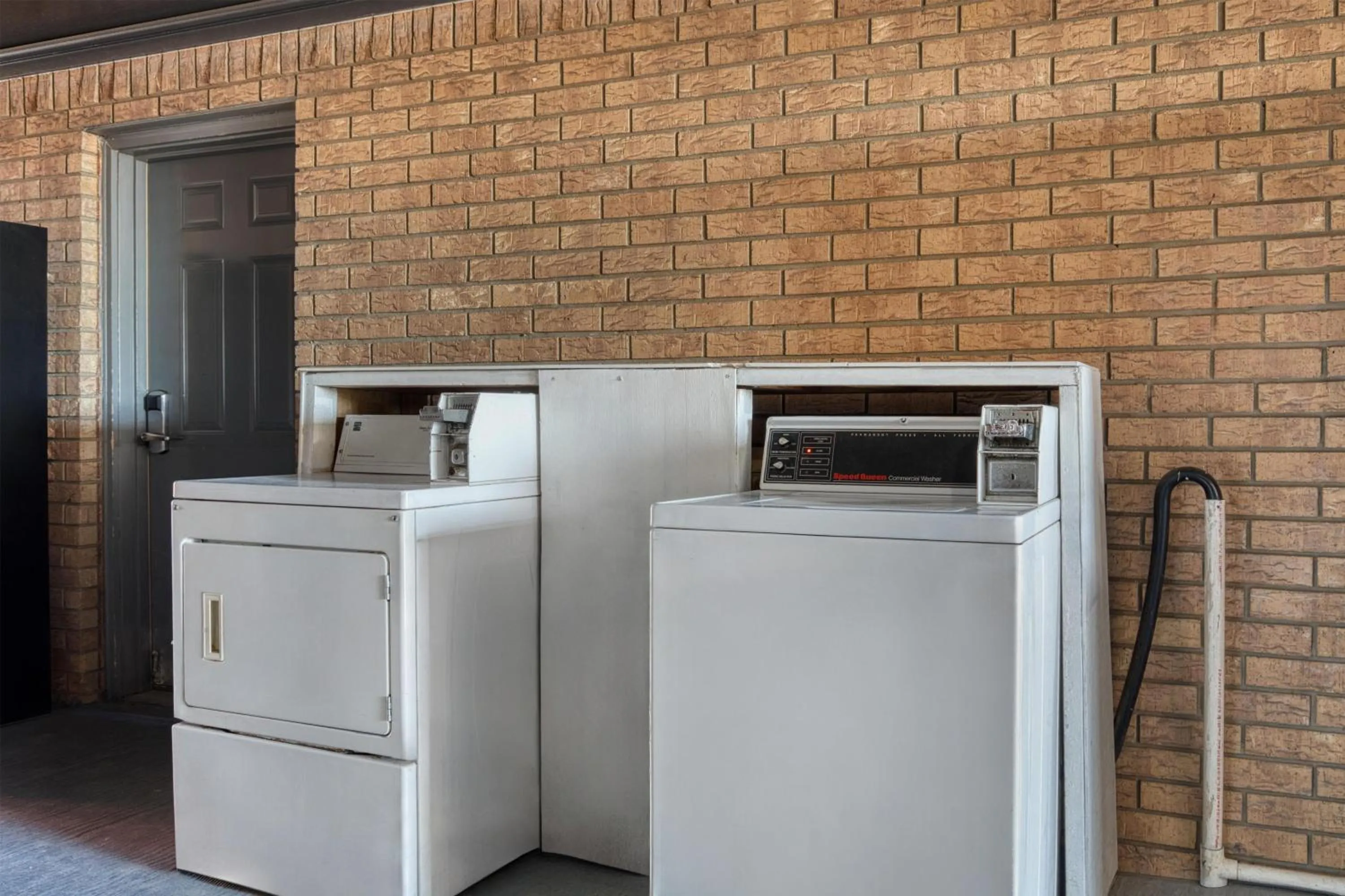 Property building in SureStay Hotel by Best Western Terrell