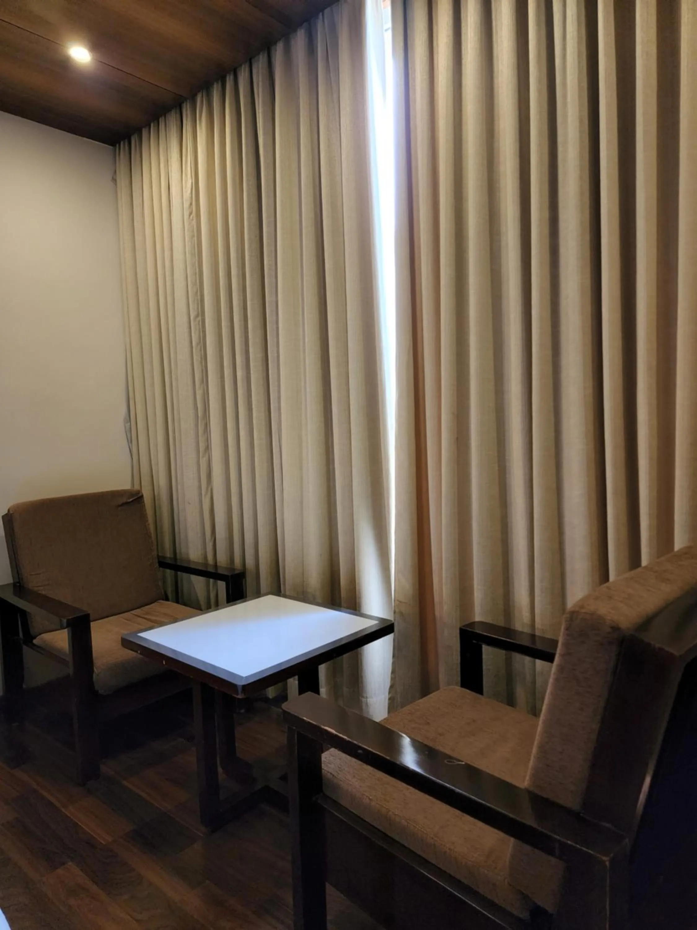 Bedroom in Hotel Preethi International