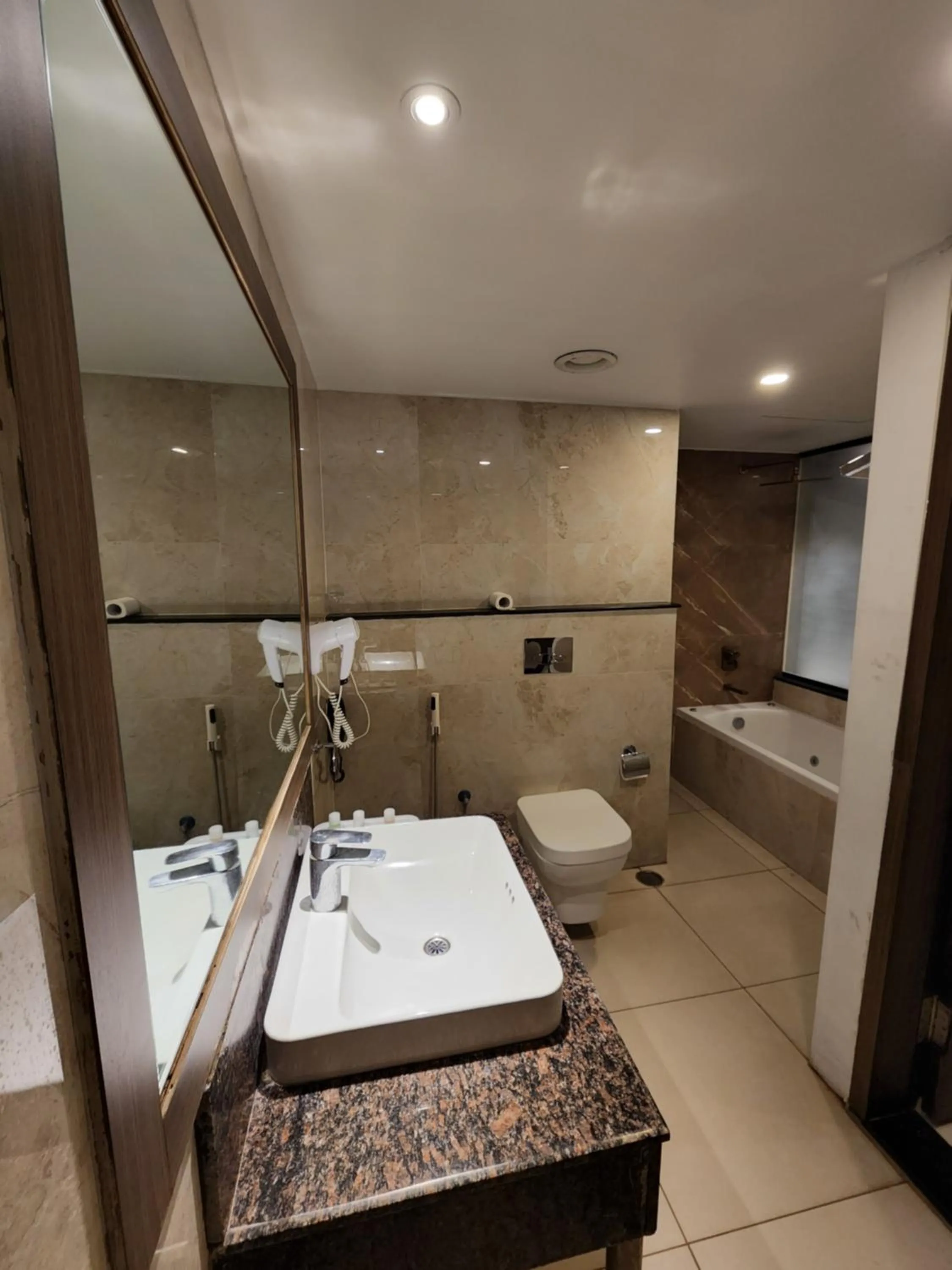 Bathroom in Hotel Preethi International