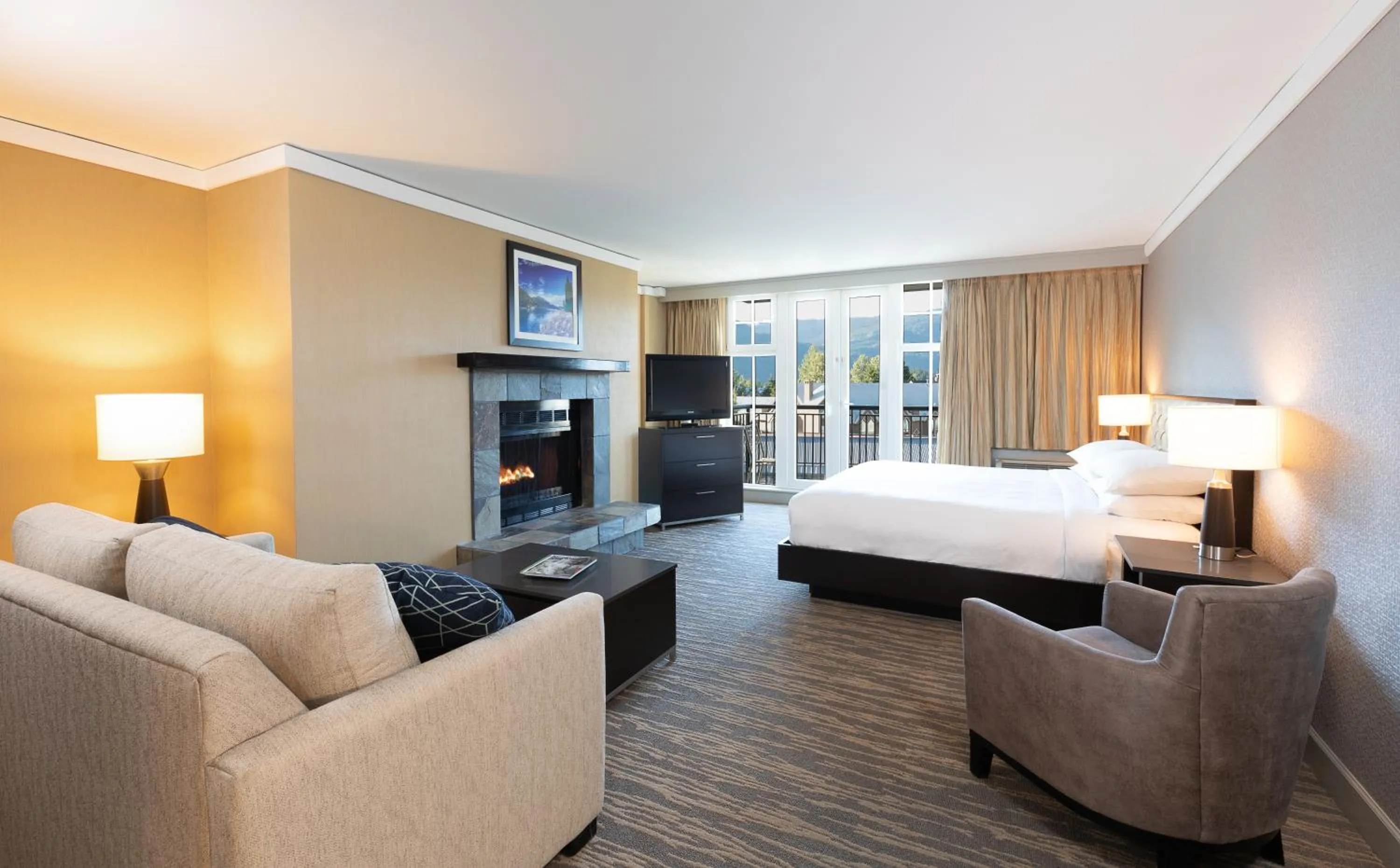 Living room, Bed in Hilton Whistler Resort & Spa