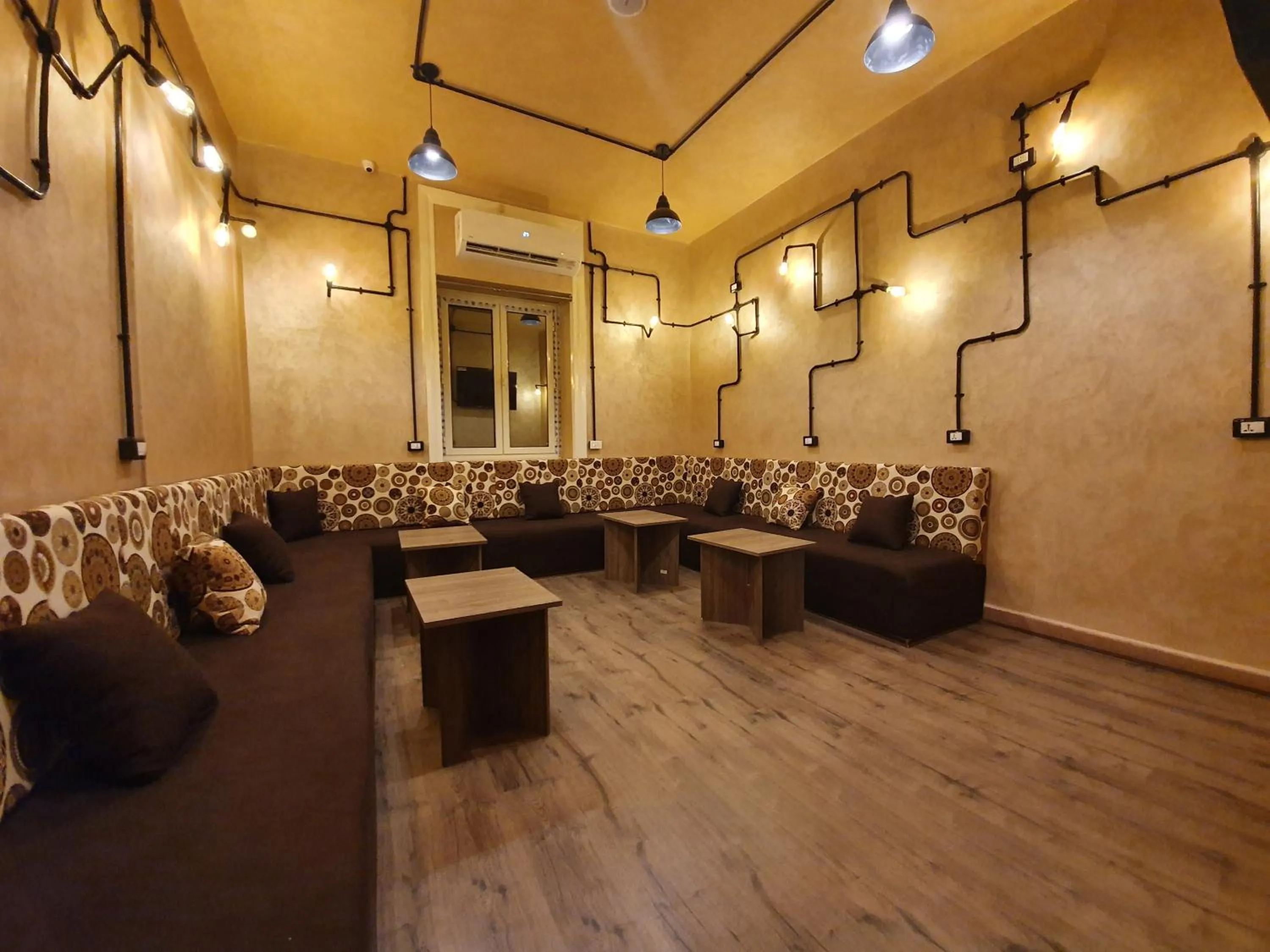 Communal lounge/ TV room in Holy Sheet Hostel