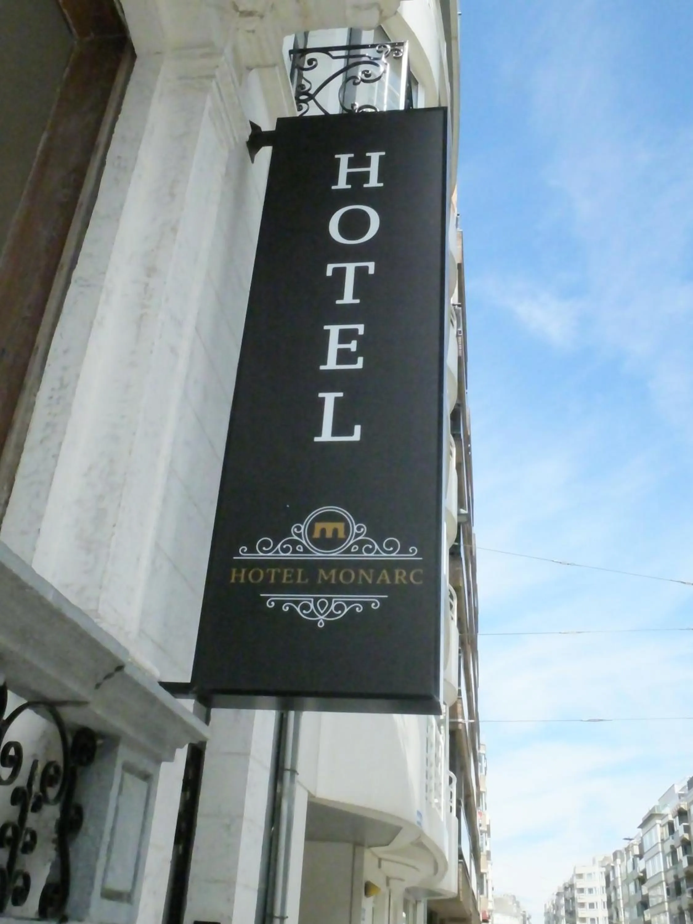 Property logo or sign in Hotel Monarc