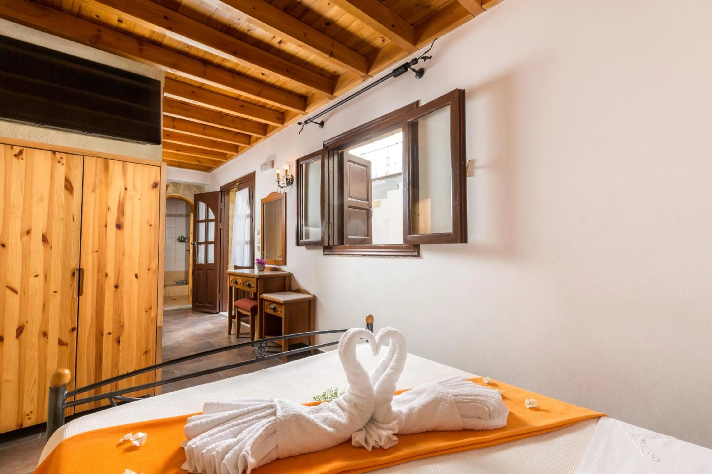 Bed in Camelot Traditional & Classic Hotel