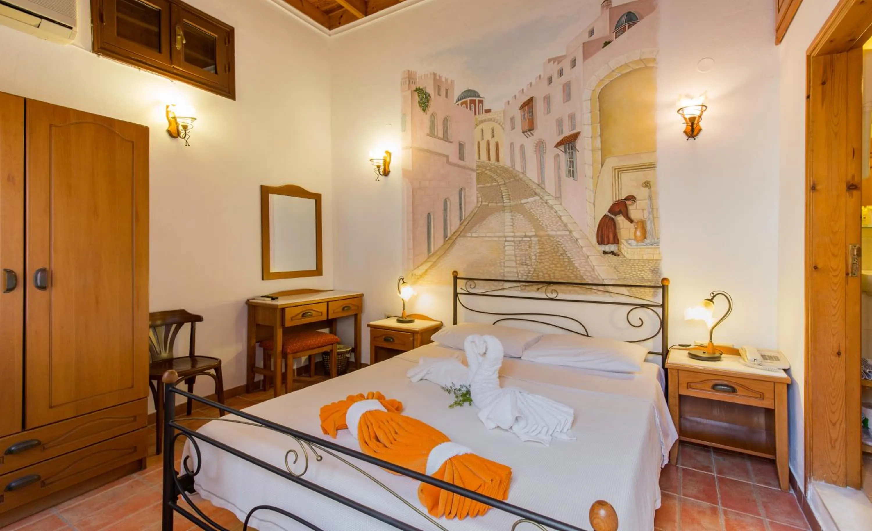 Bed in Camelot Traditional & Classic Hotel