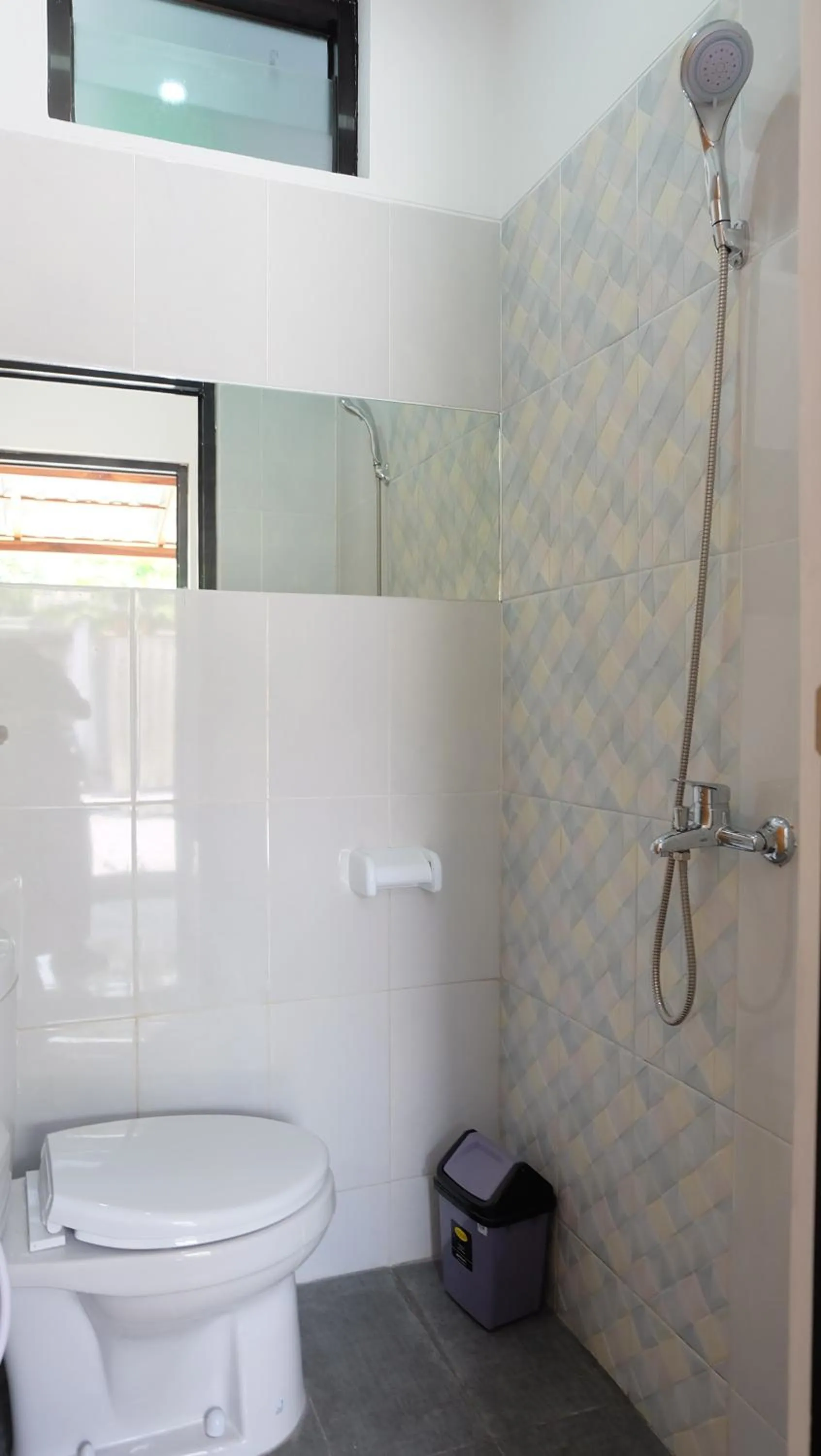 Bathroom in Hotel Jogja Kili Suci By Simply Homy