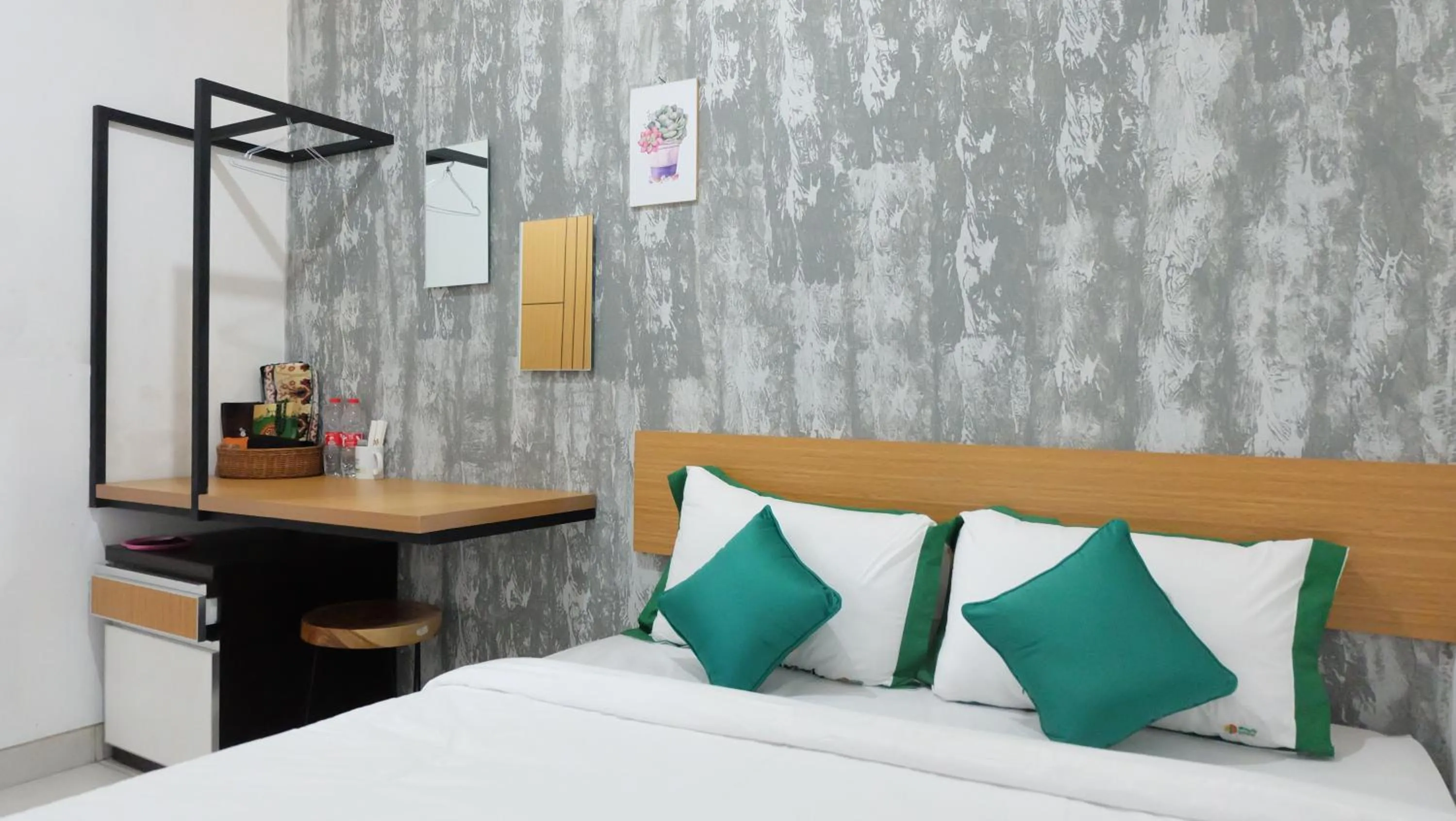 Bed in Hotel Jogja Kili Suci By Simply Homy