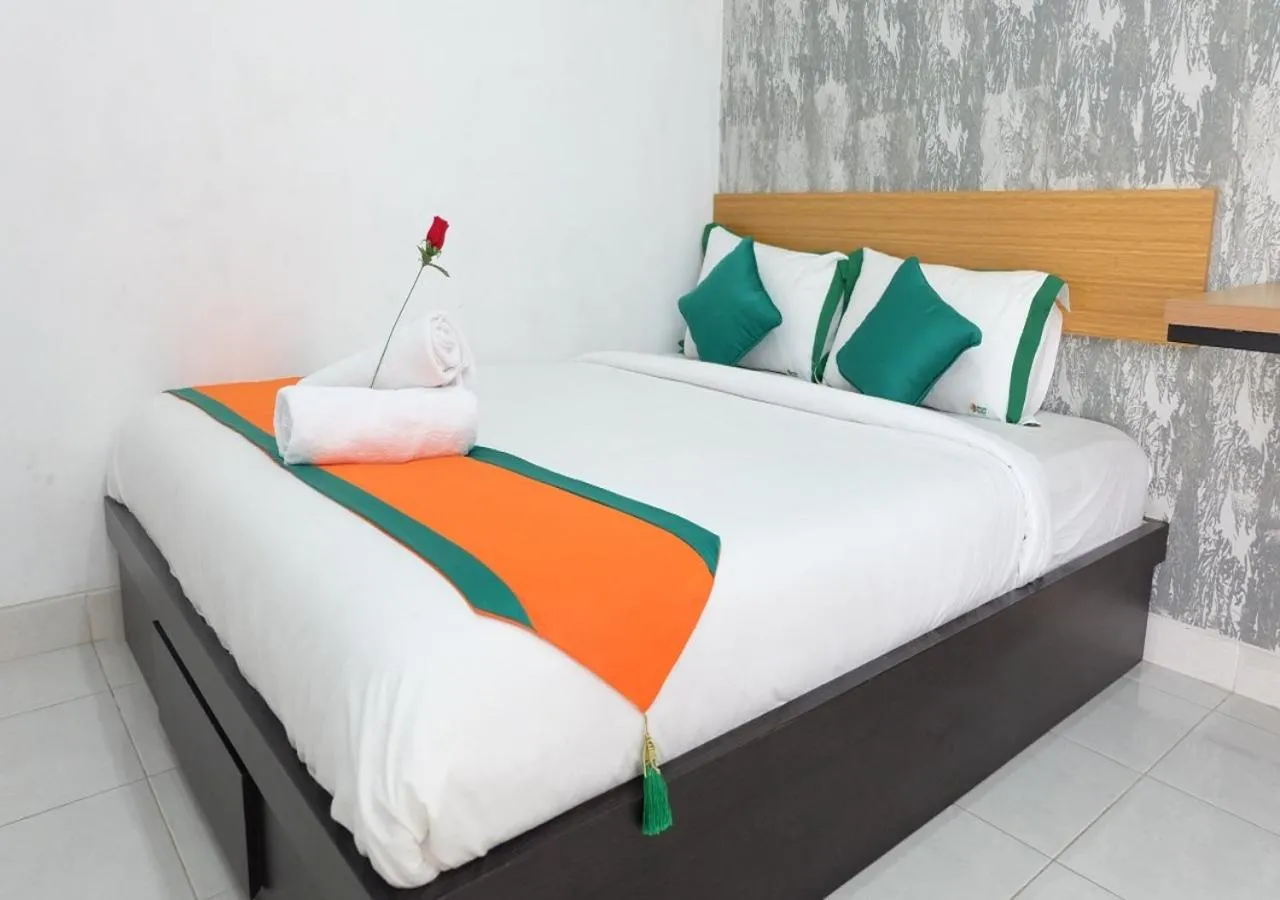 Bed in Hotel Jogja Kili Suci By Simply Homy