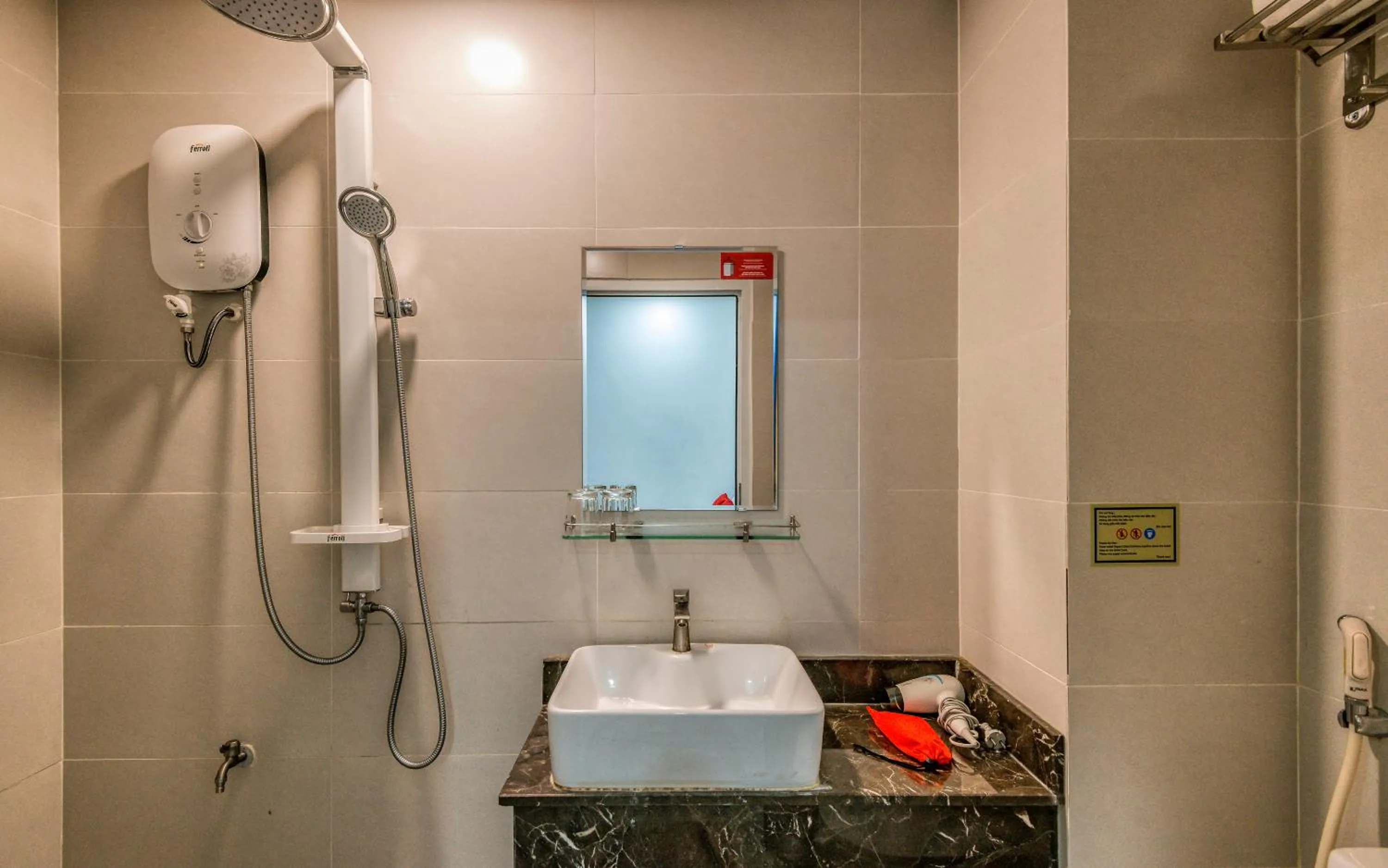 Shower in Cherry Hotel and Apartment
