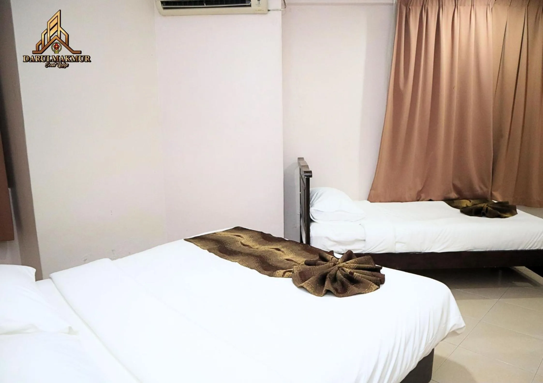 Bed in DarulMakmur Scout Lodge