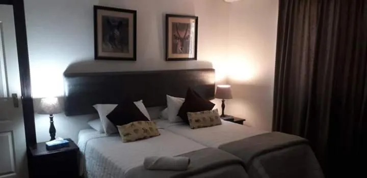 Bed in Kalahari Lodge Kimberley