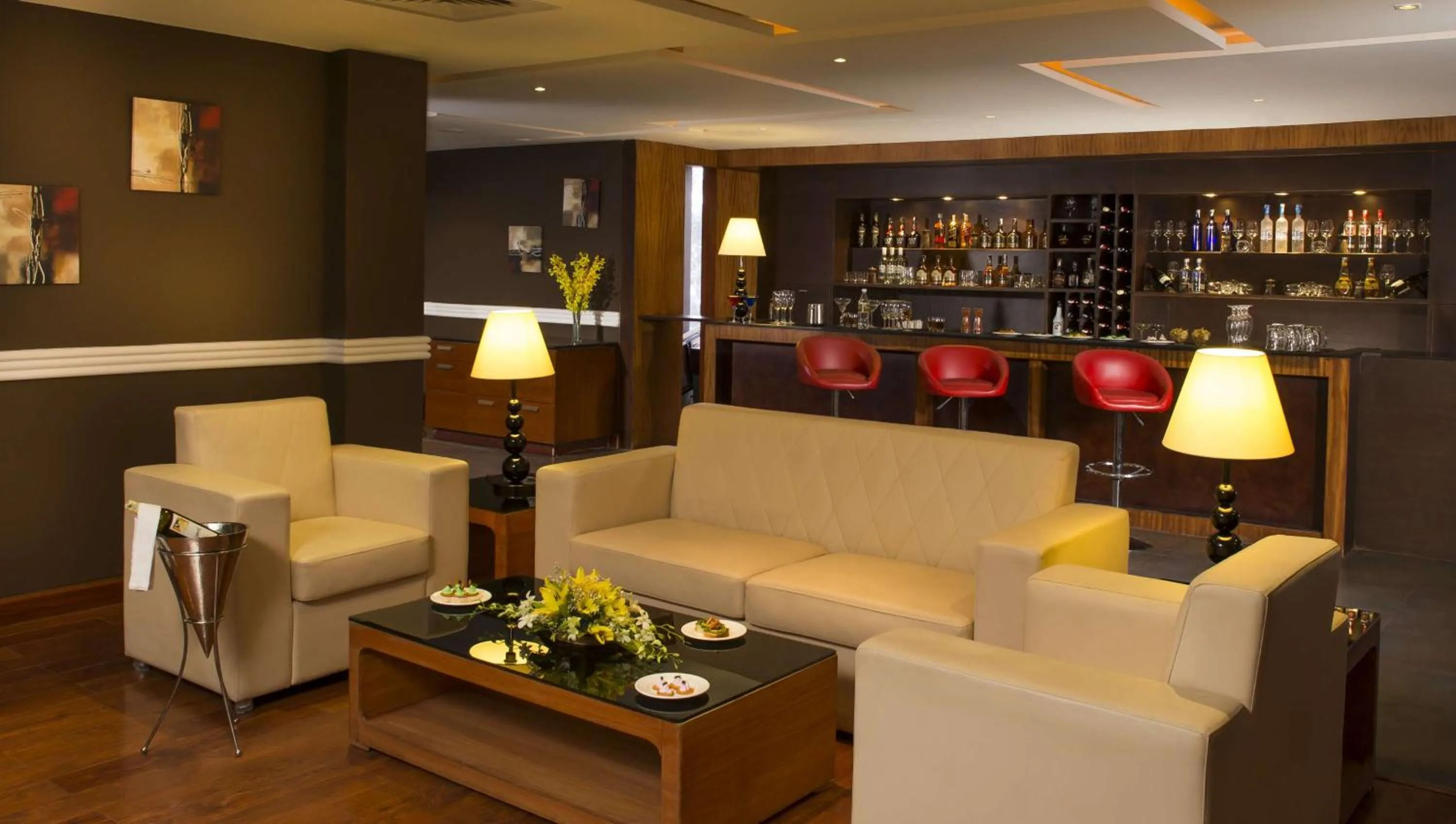 Lounge or bar in Mysore County Retreat