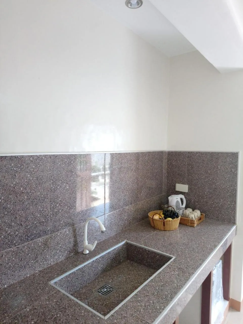 Communal kitchen in J and C Residences