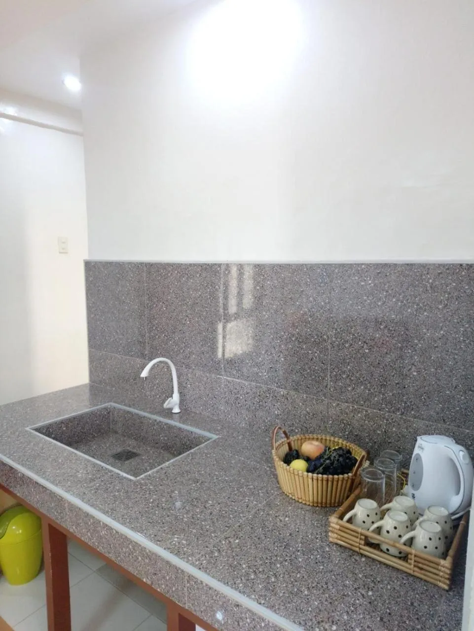 Communal kitchen in J and C Residences