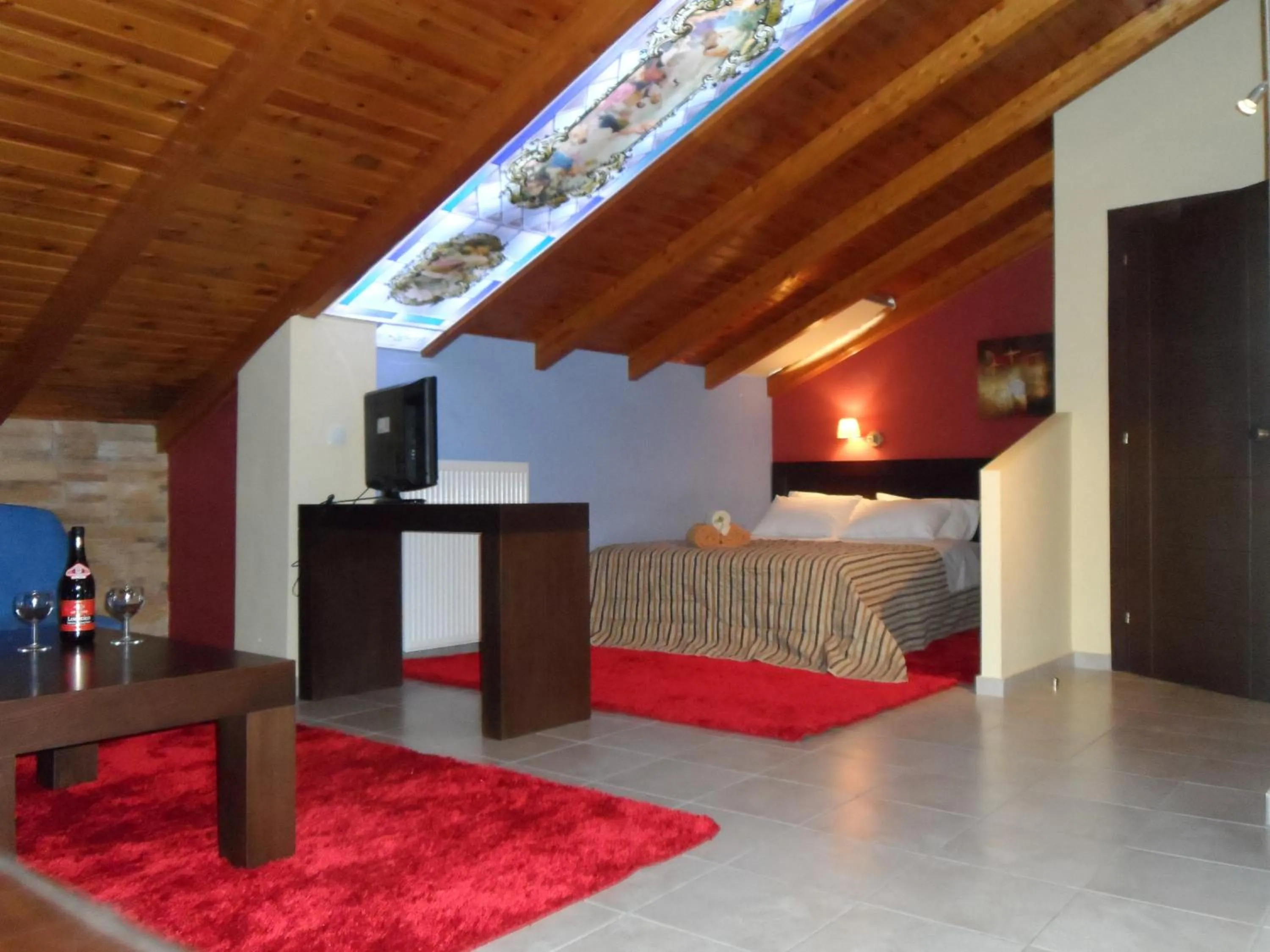 Photo of the whole room, Bed in Hotel Prigipikon Suites and sofites