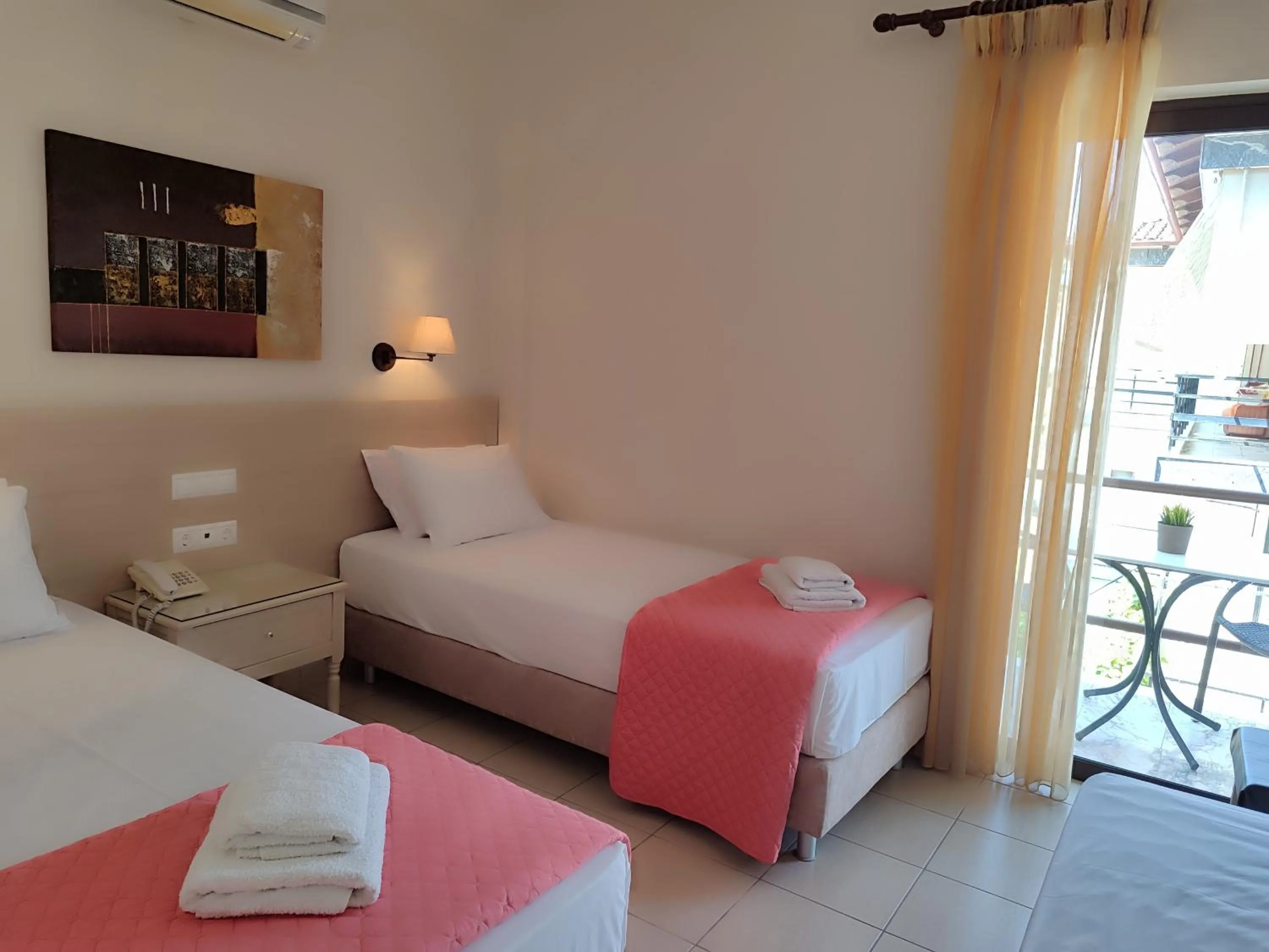 Bed in Hotel Prigipikon Suites and sofites
