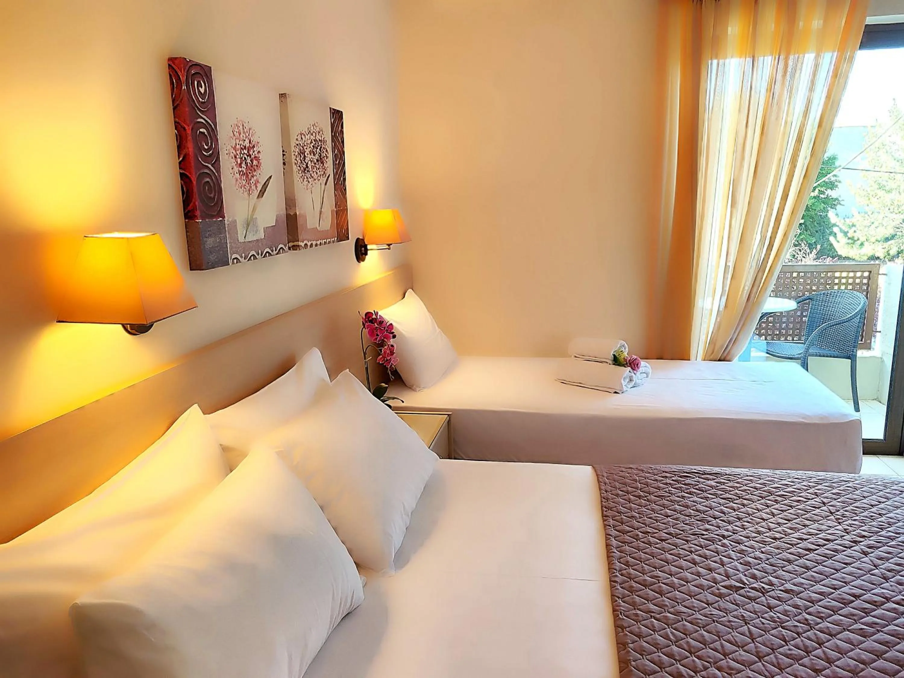 Bed in Hotel Prigipikon Suites and sofites