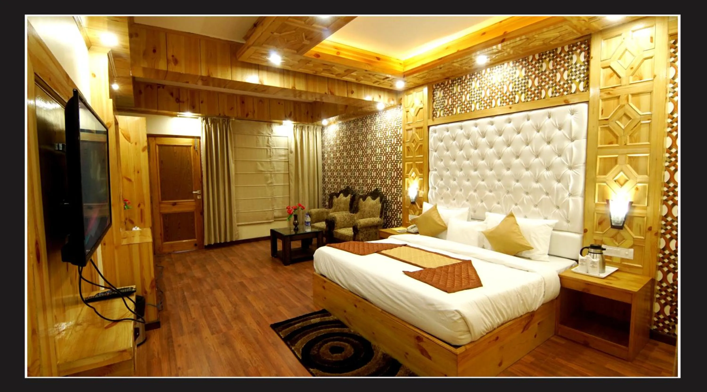 Photo of the whole room, Bed in Grand Krisa Resort & SPA, Manali Experience Luxury With all Weather ACs in Every Room