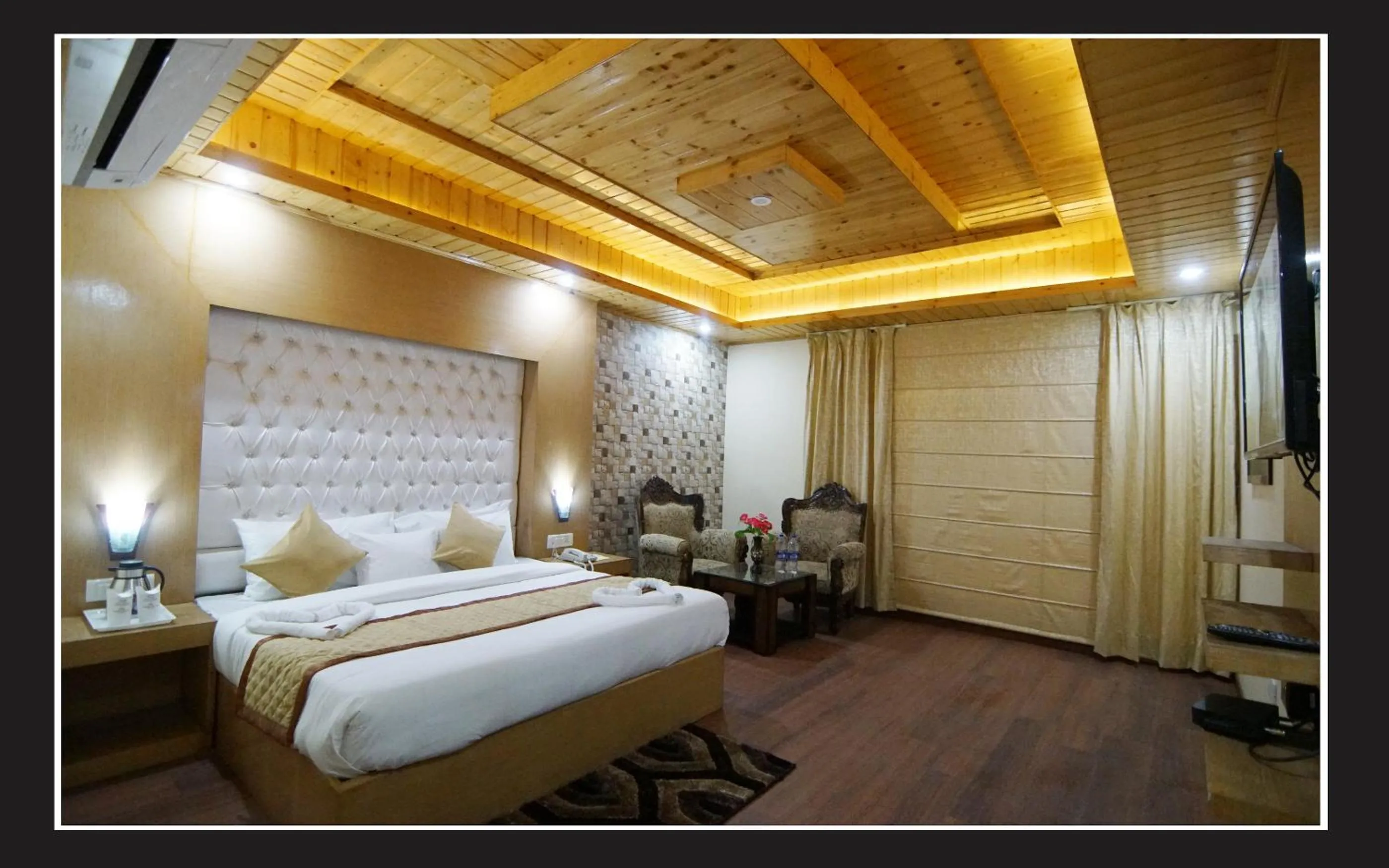 Bed in Grand Krisa Resort & SPA, Manali Experience Luxury With all Weather ACs in Every Room