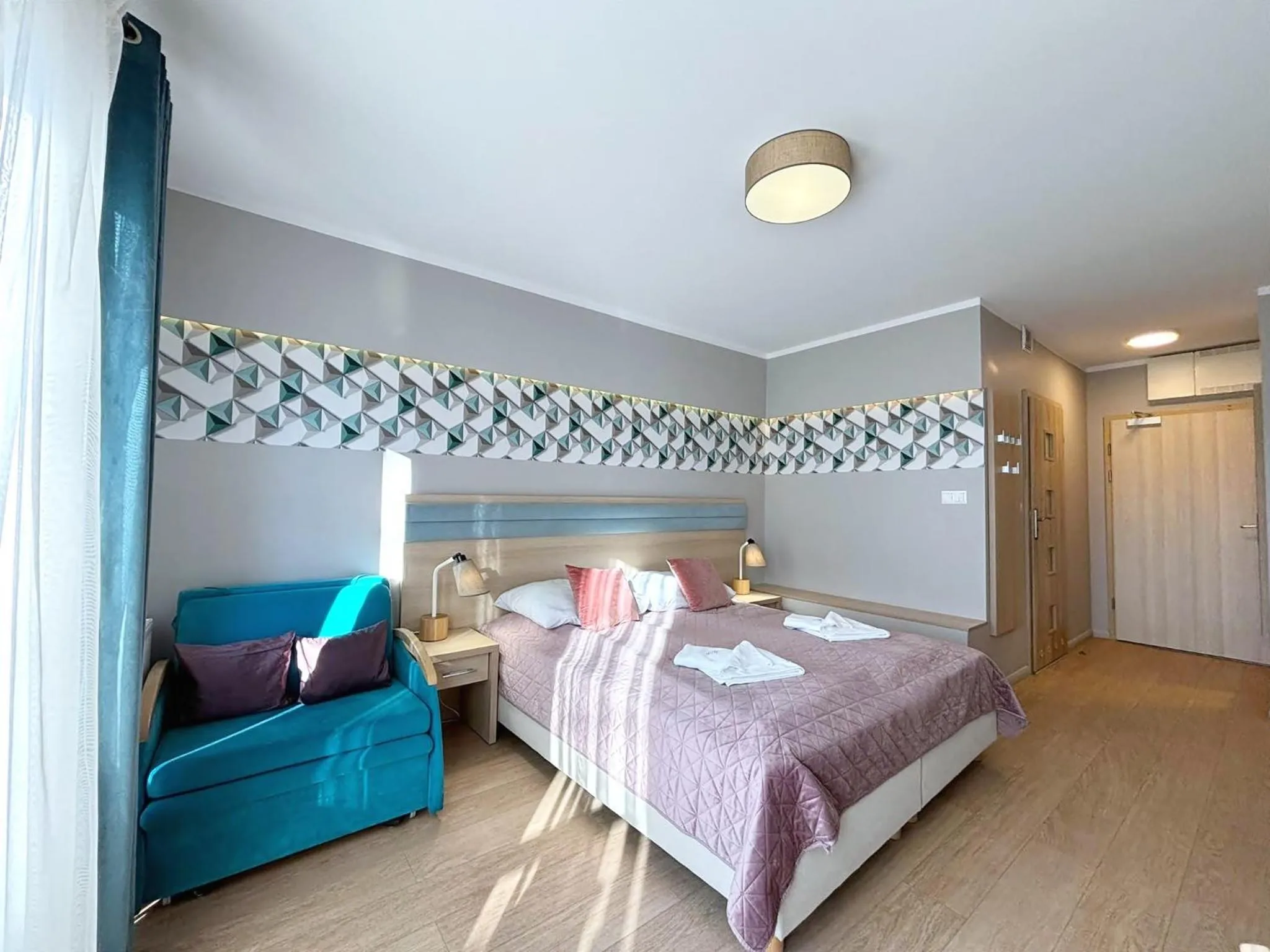 Bed in Osiedle Cesarskie Apartamenty - Parking - Apartamenty Bryza