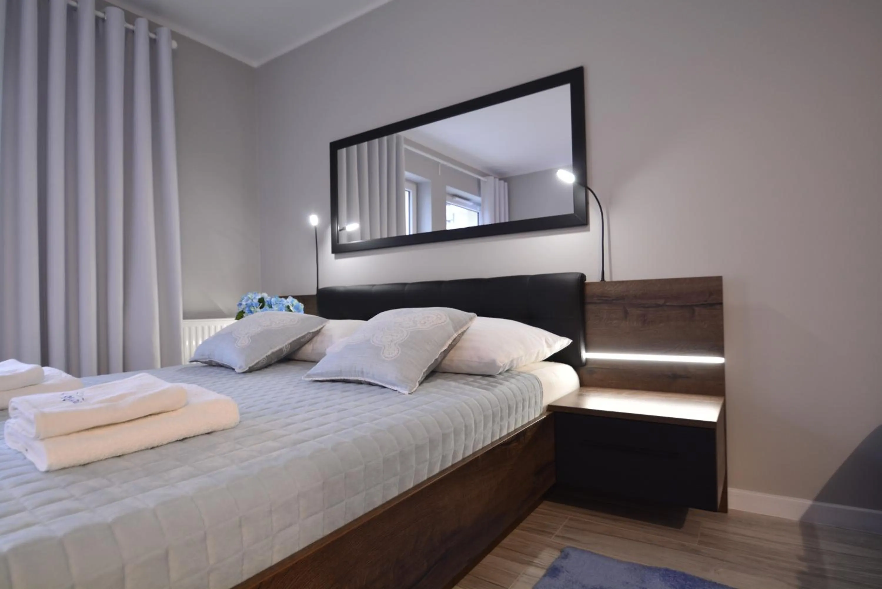 Photo of the whole room, Bed in Osiedle Cesarskie Apartamenty - Parking - Apartamenty Bryza