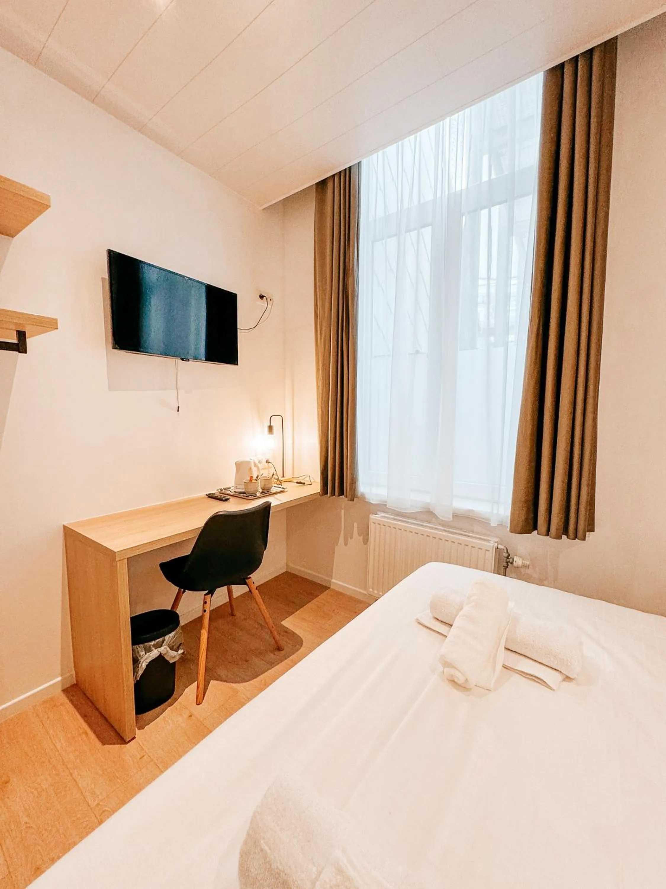 Photo of the whole room, Bed in Alpha Hotel