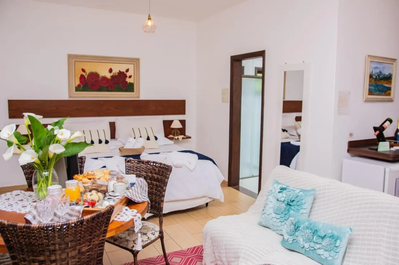 Bed in Pousada Medeiros