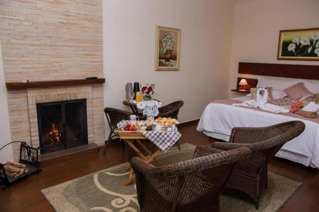 Bed in Pousada Medeiros