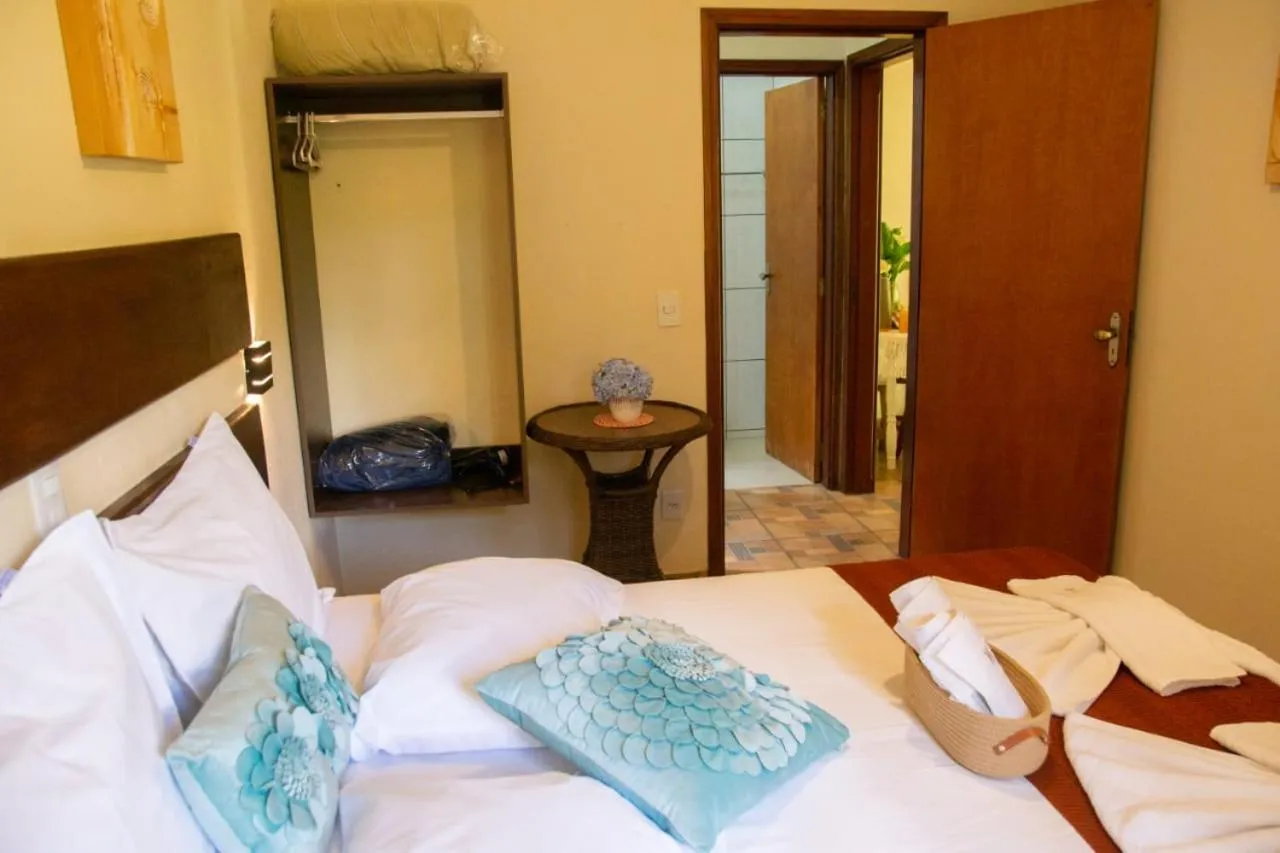 Bed in Pousada Medeiros