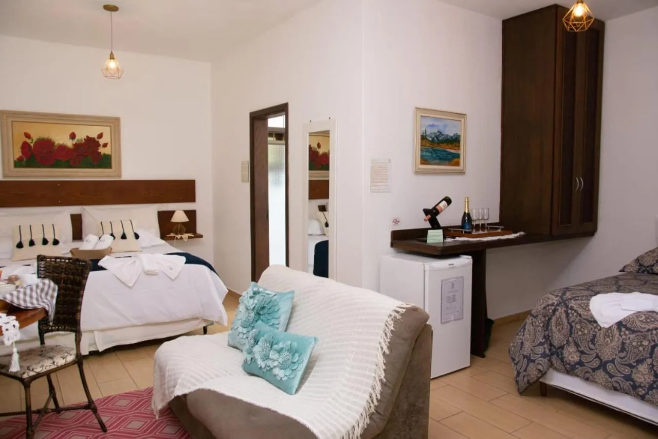 Bed in Pousada Medeiros