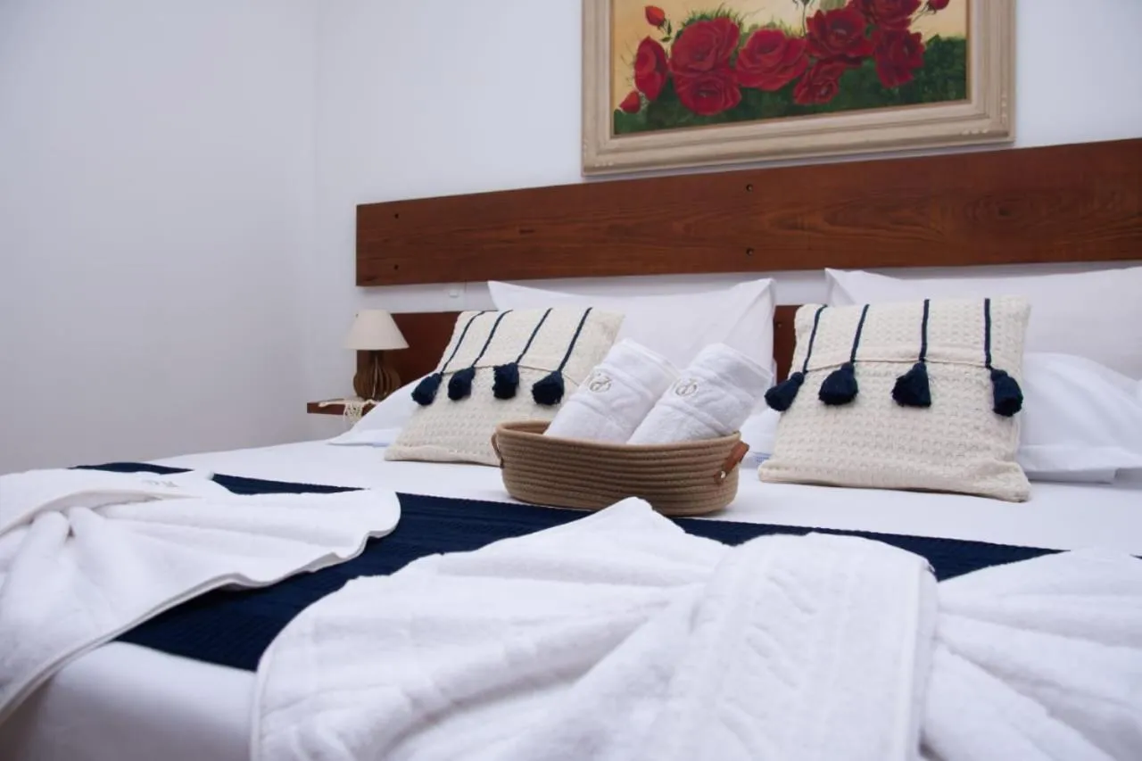 Bed in Pousada Medeiros