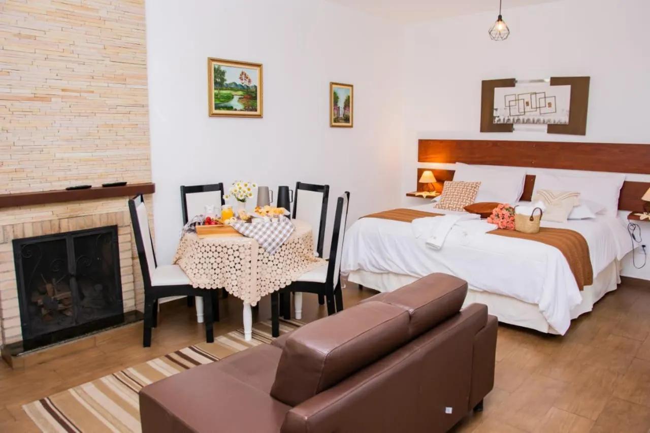 Bed in Pousada Medeiros