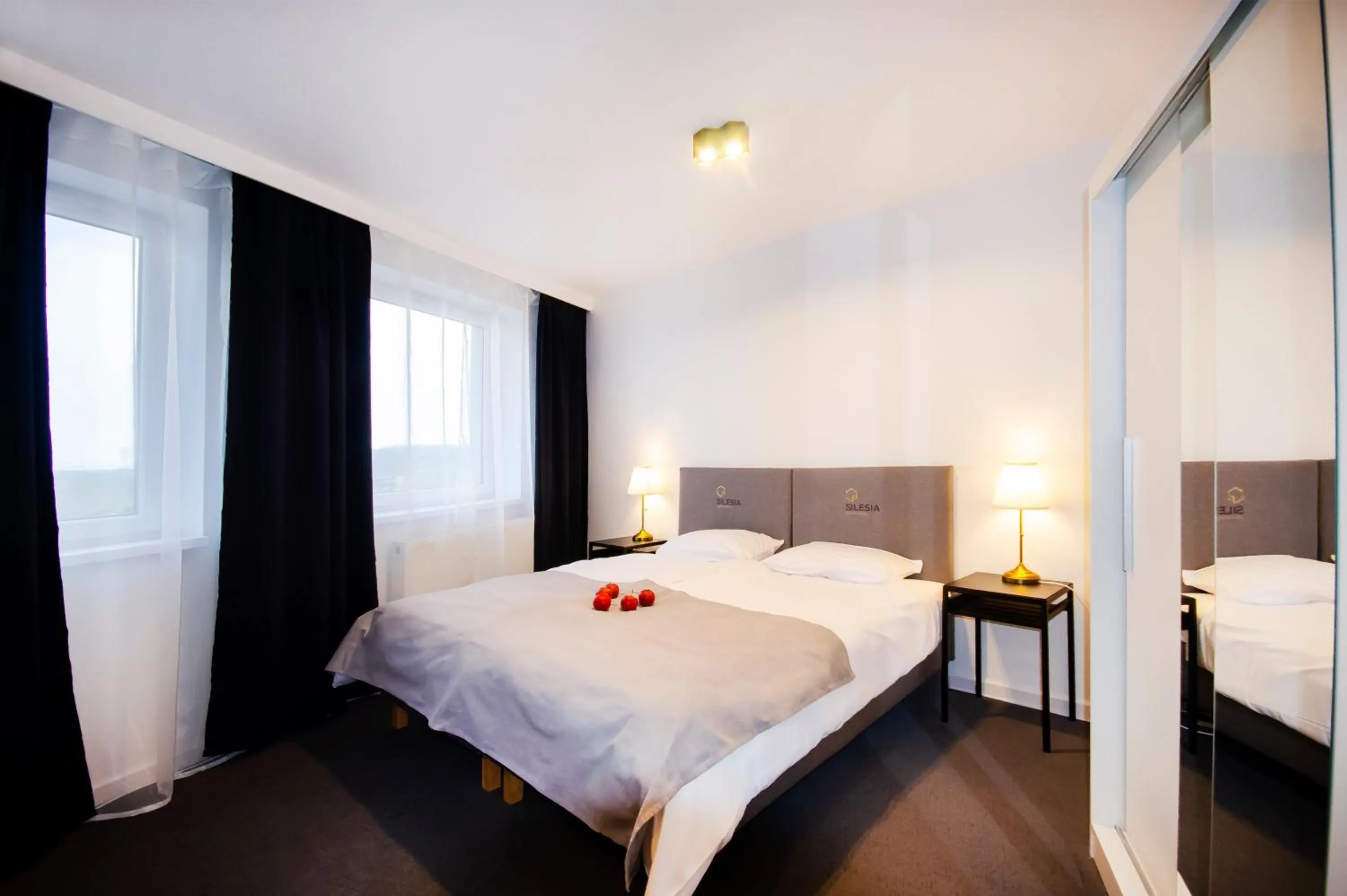 Bed in Silesia Apartments