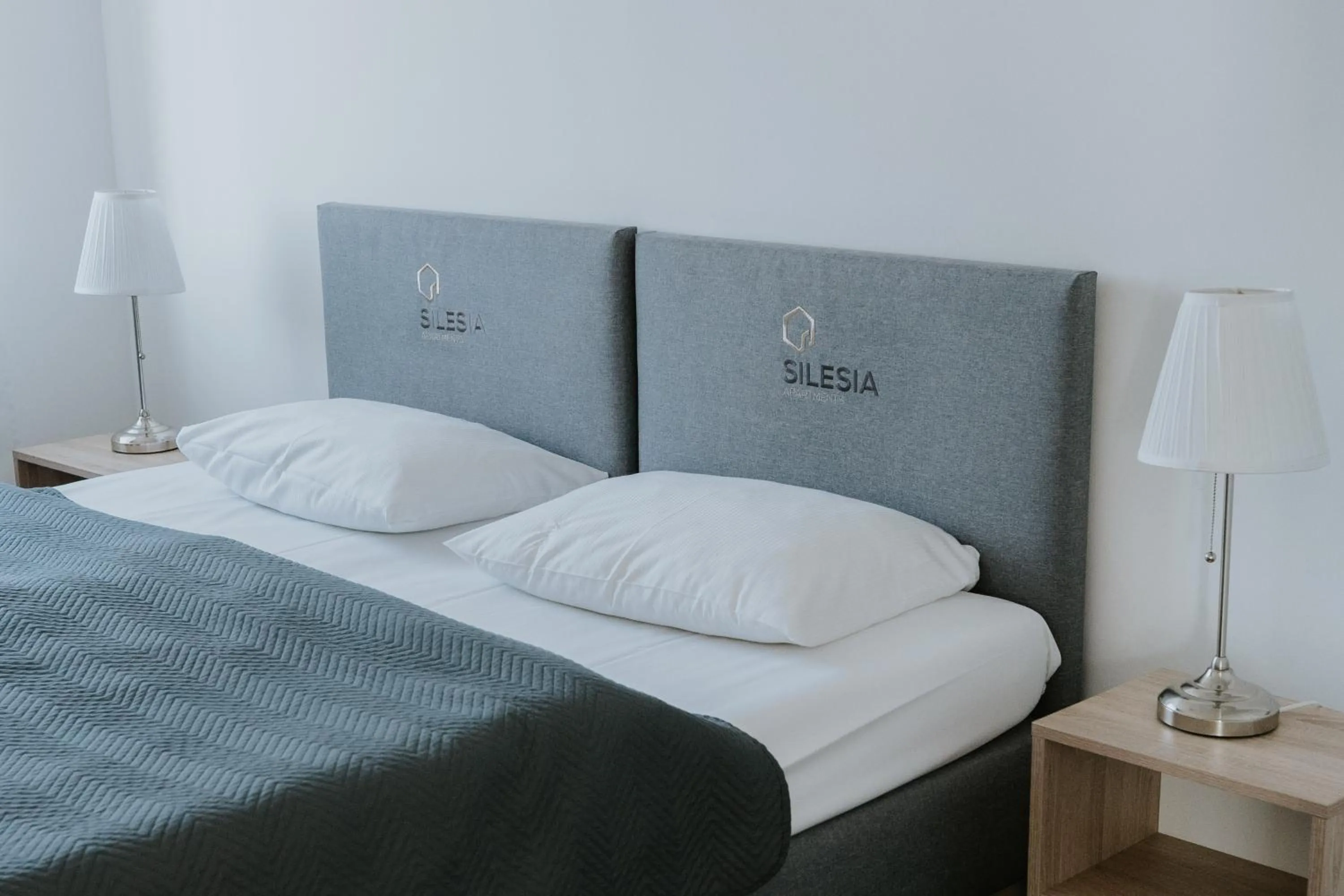 Bed in Silesia Apartments