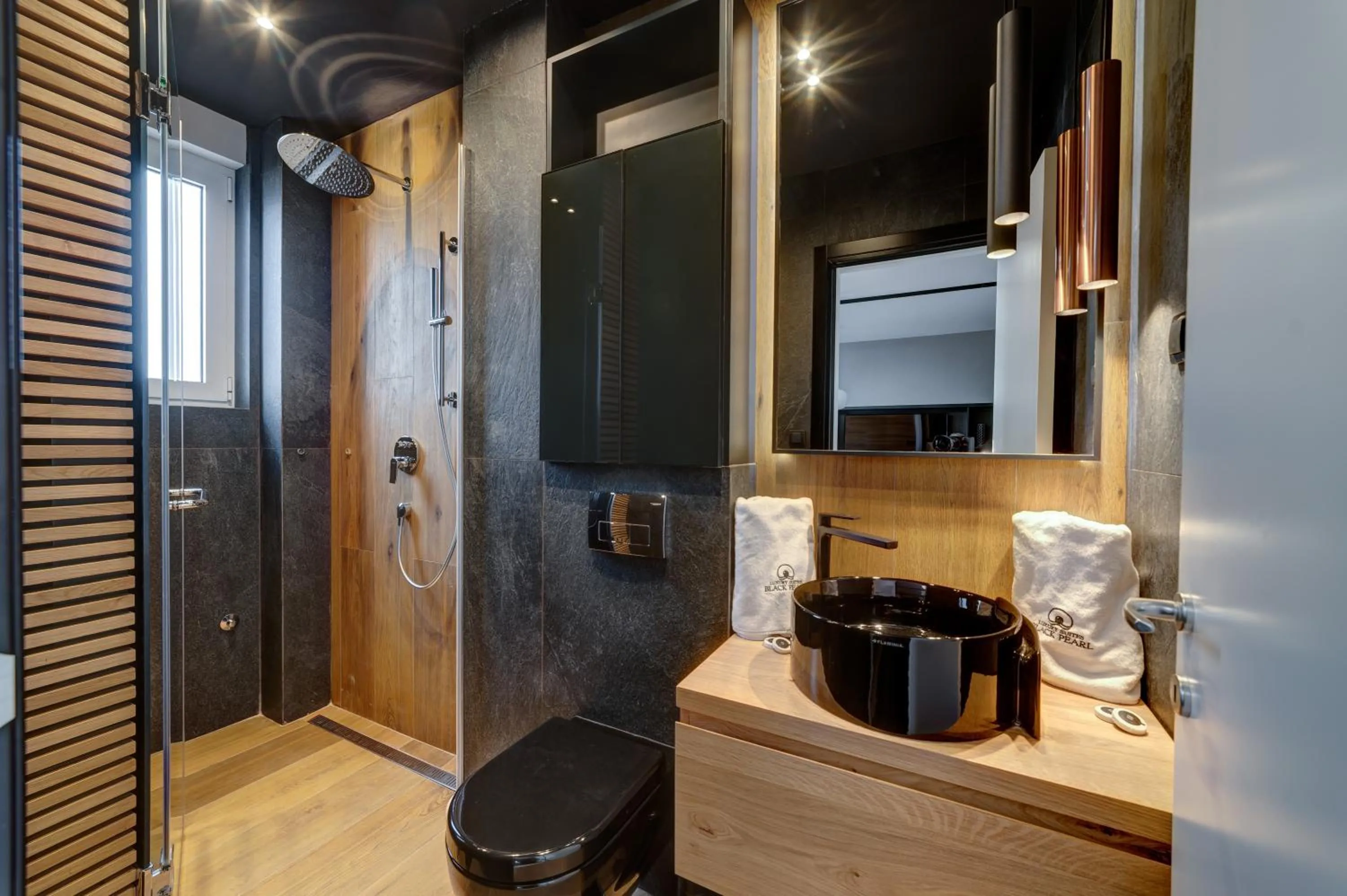 Shower in Black Pearl Luxury Suites