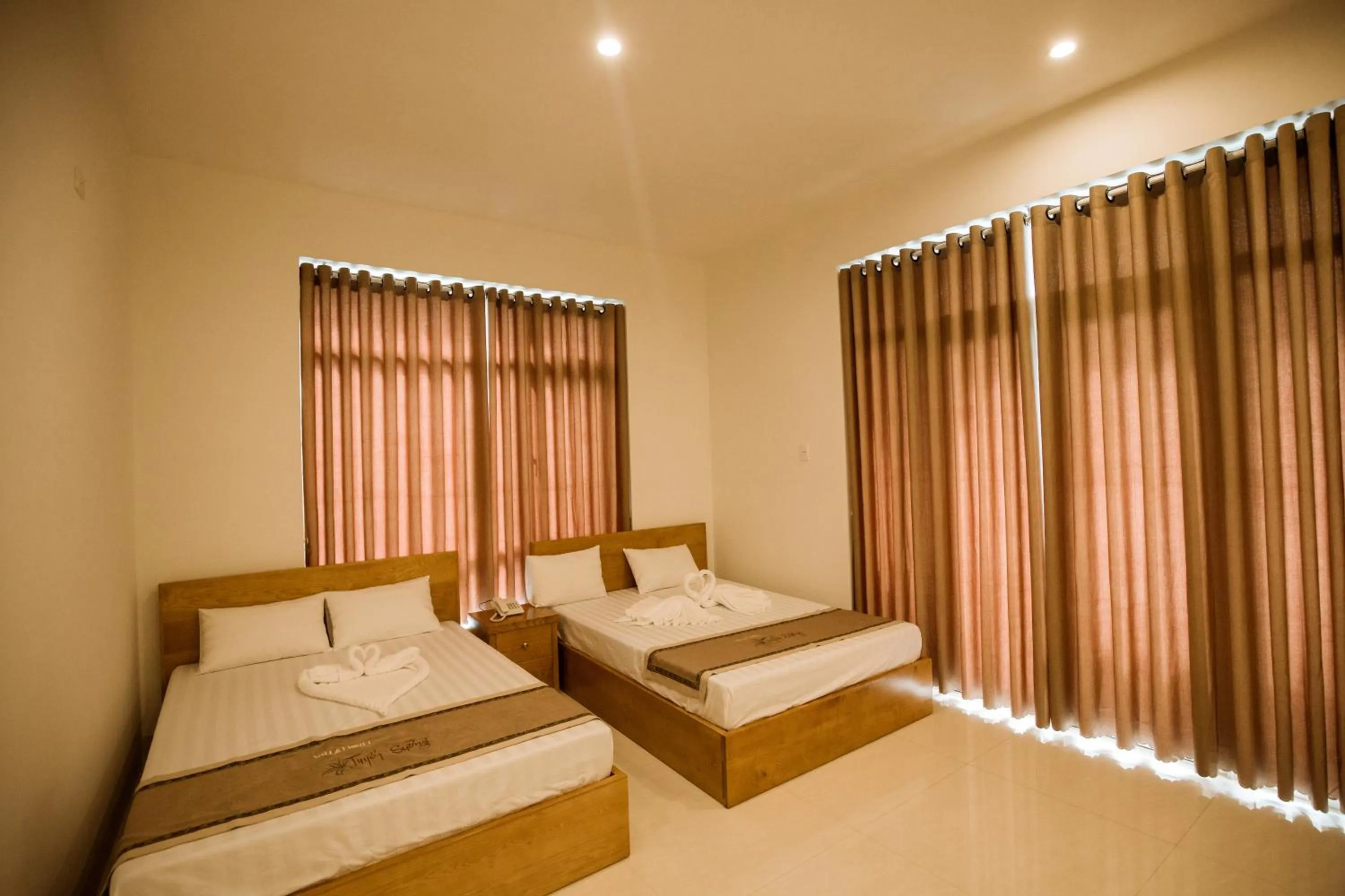 Bed in Tuyet Suong Villa Hotel