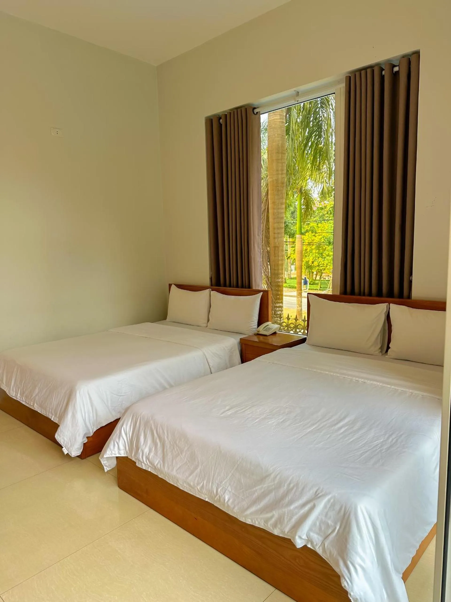 Bed in Tuyet Suong Villa Hotel