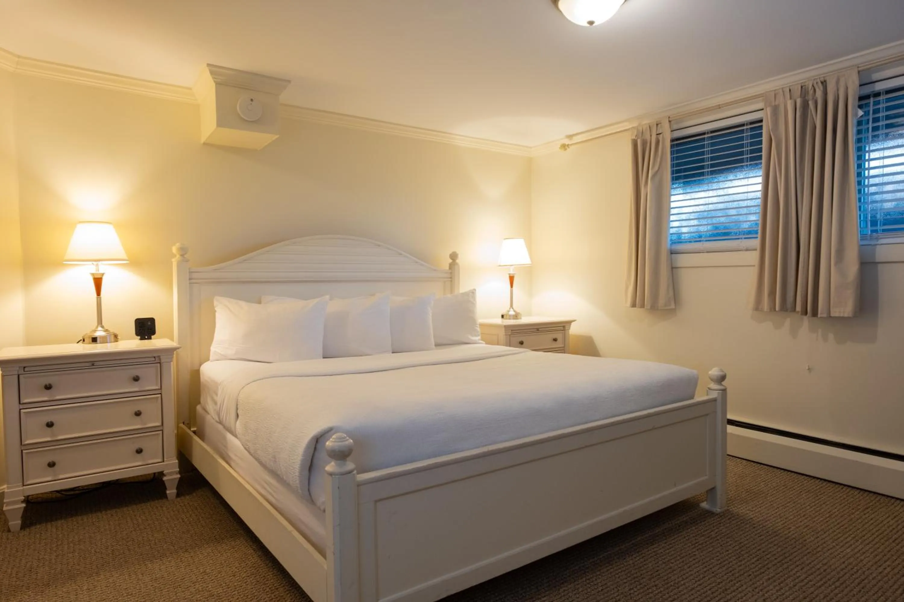 Bed in Senator Inn & Spa