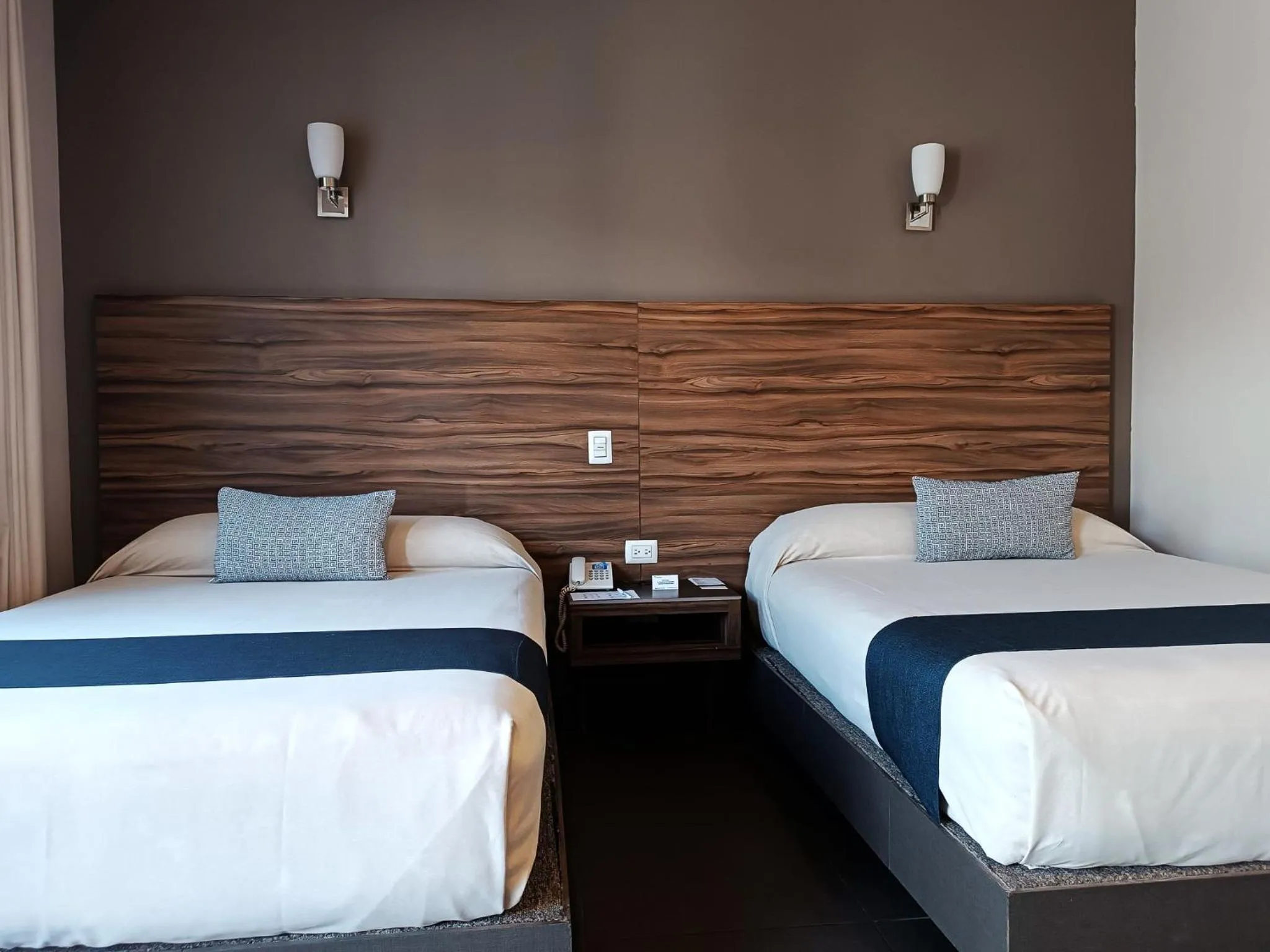 Bed in Hotel Panamerican