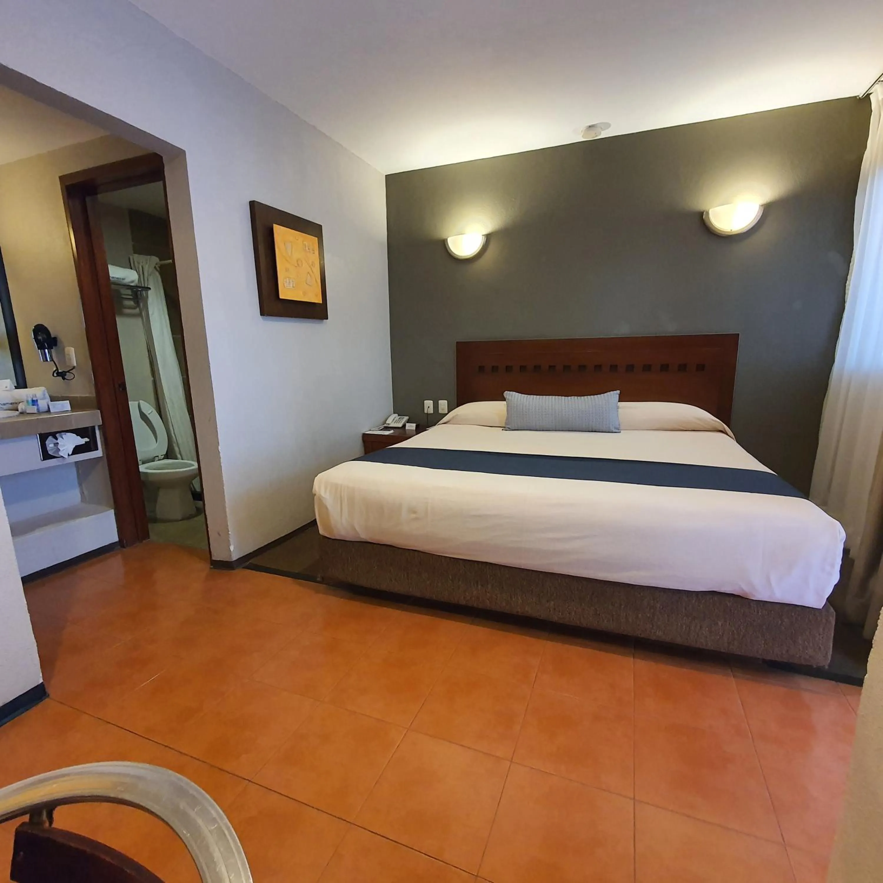 Bed in Hotel Panamerican