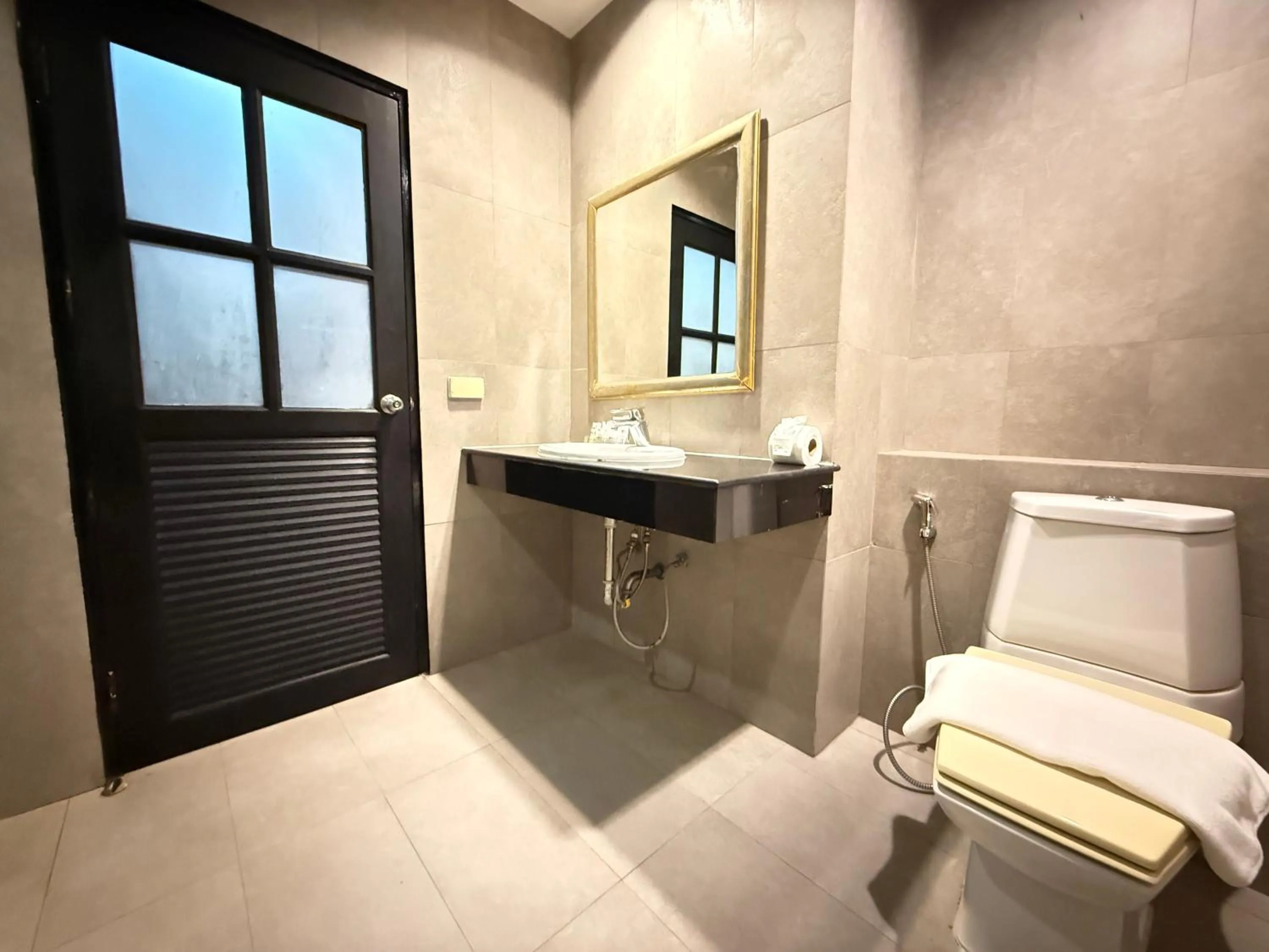 Bathroom in Nova Park Hotel Pattaya