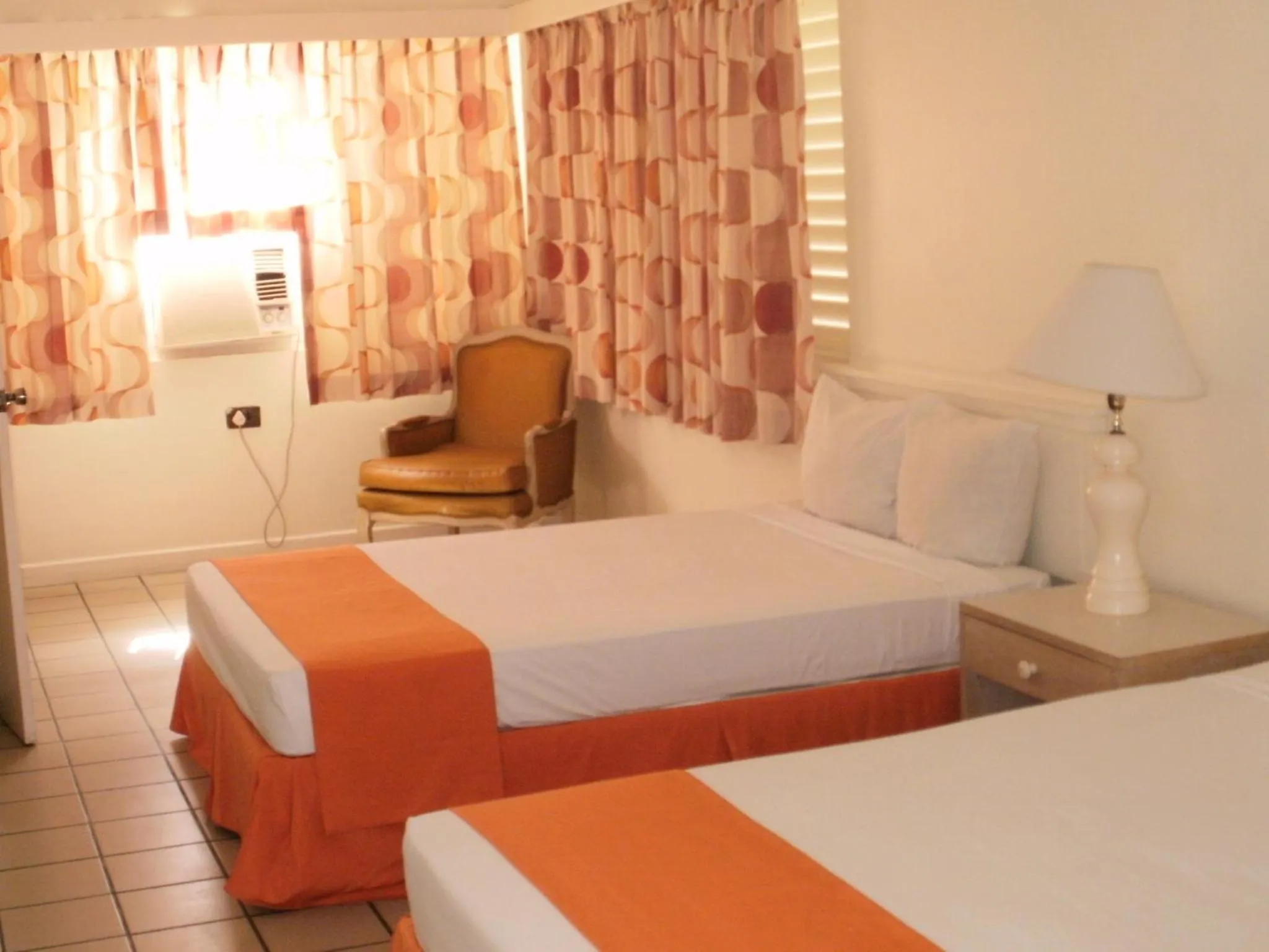 Photo of the whole room, Bed in Pineapple Court Hotel