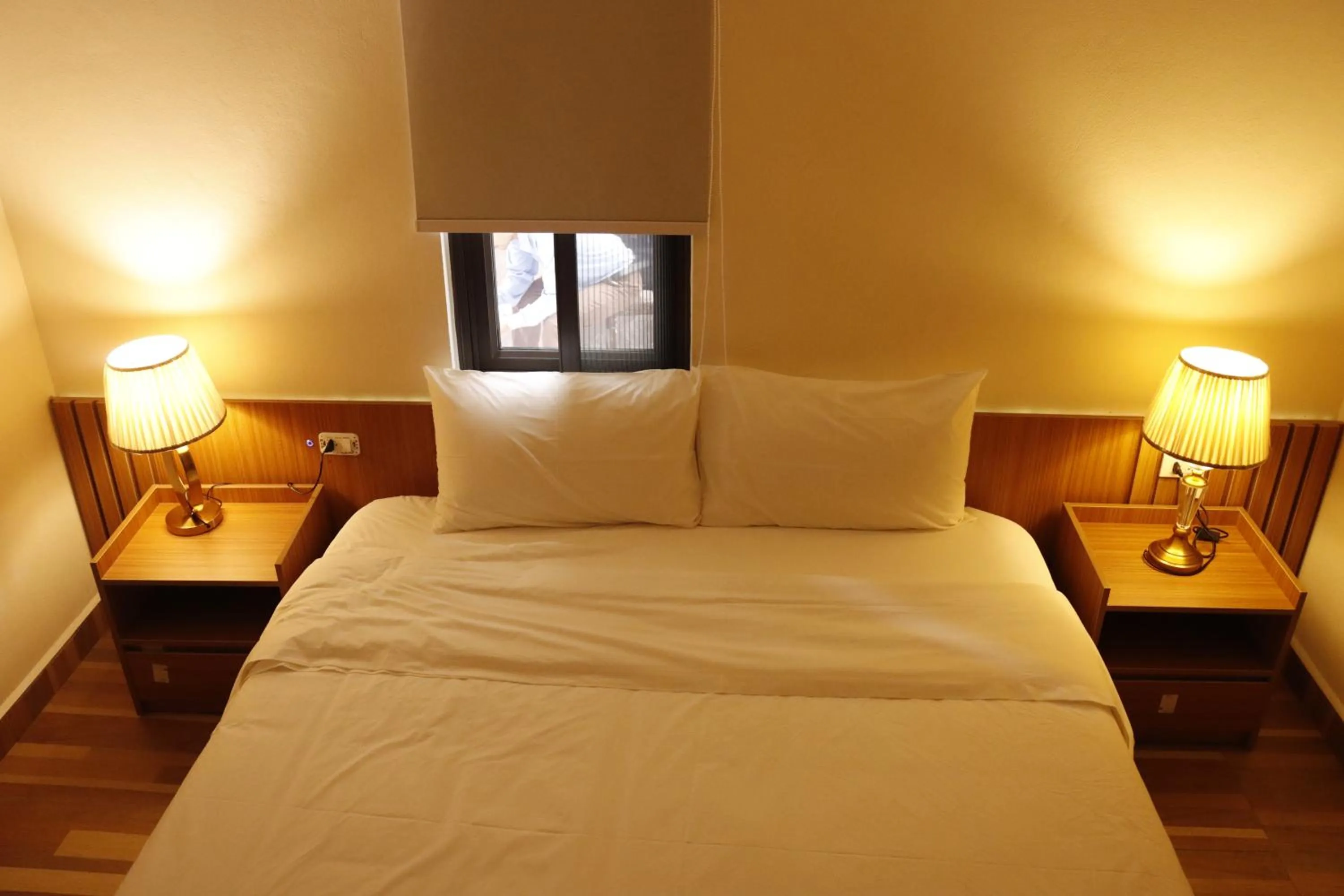 Bed in Hoang Kim Hotel